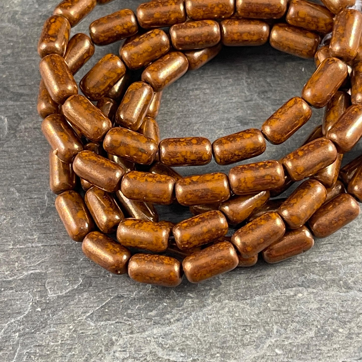 Czech Glass Beads - Dark Orange and Bronze 9x5mm Tube Bead, Burnt Orange with Bronze Picasso (TBE/N-2107) * Qty. 16