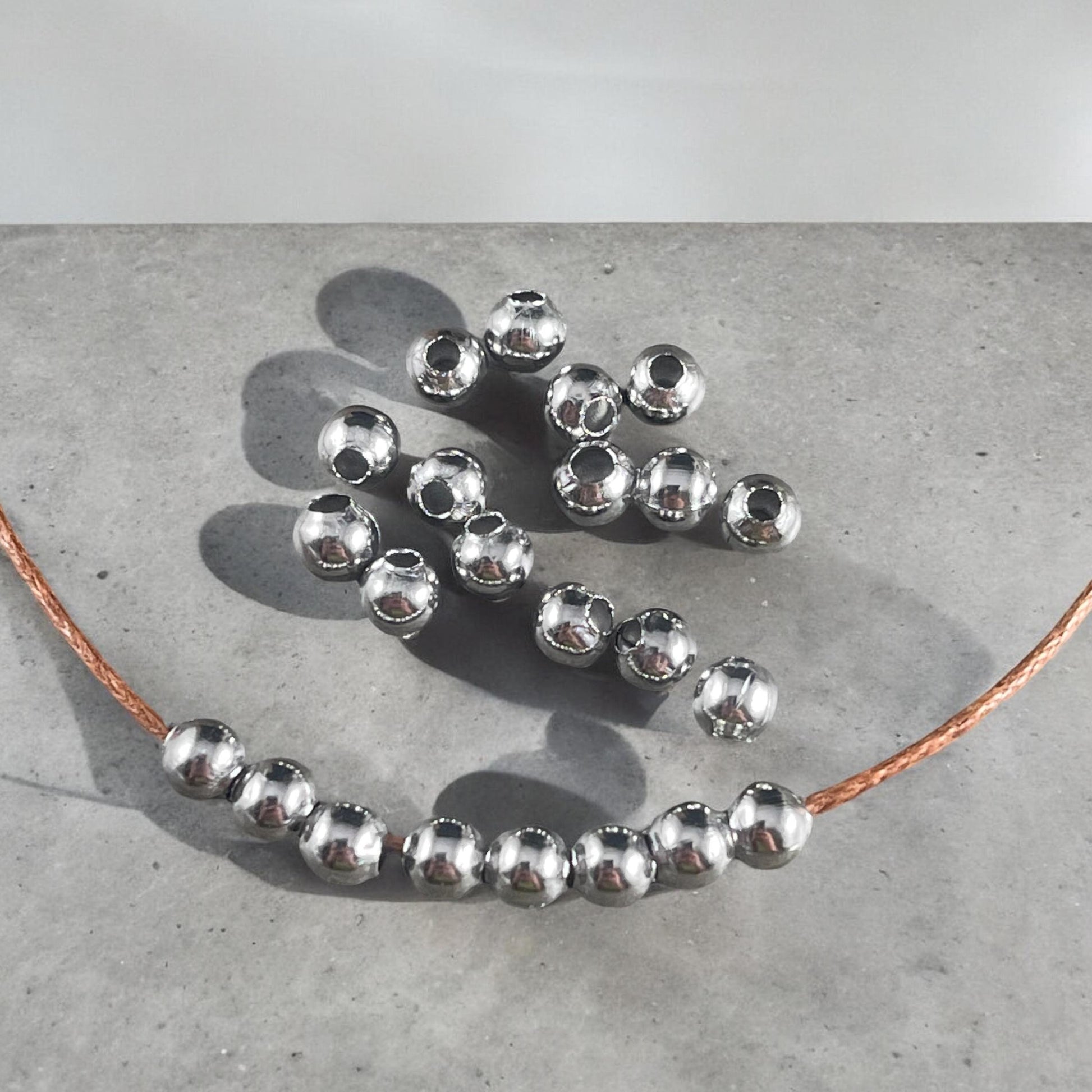 4mm Stainless Steel Round Beads - 1.6mm hole - Hollow, Lightweight (I050-4mm) * Qty. 75