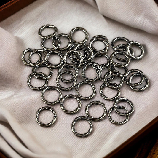8mm Twisted Jumprings, 16g Open, Antiqued Brass (FMG/5032) * Qty. 100