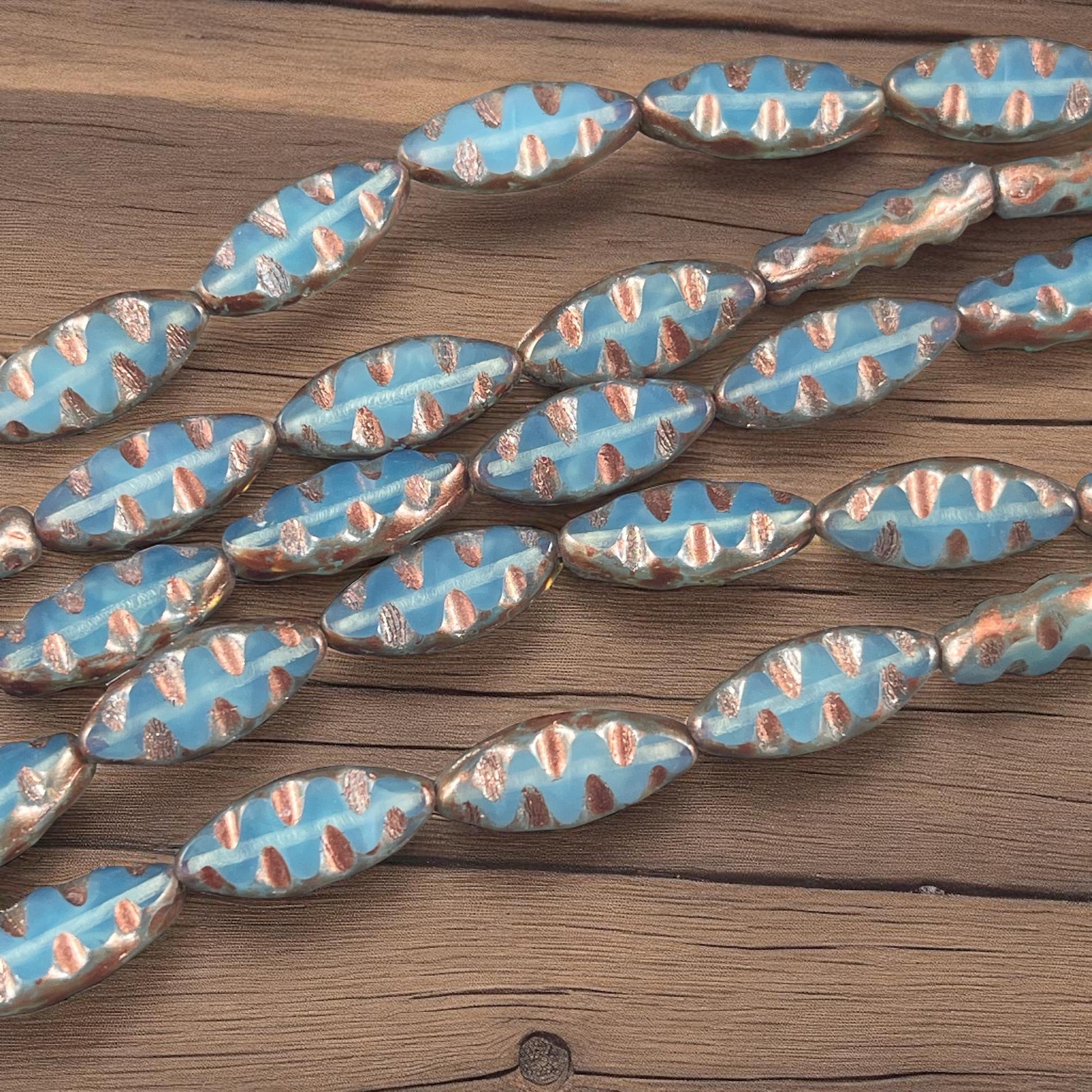 Czech Glass Beads - Pale Blue Opal with Copper Picasso Oval Spindle Bead, 17x8mm Table Cut Spindle (TSpndl-16) * Qty. 8