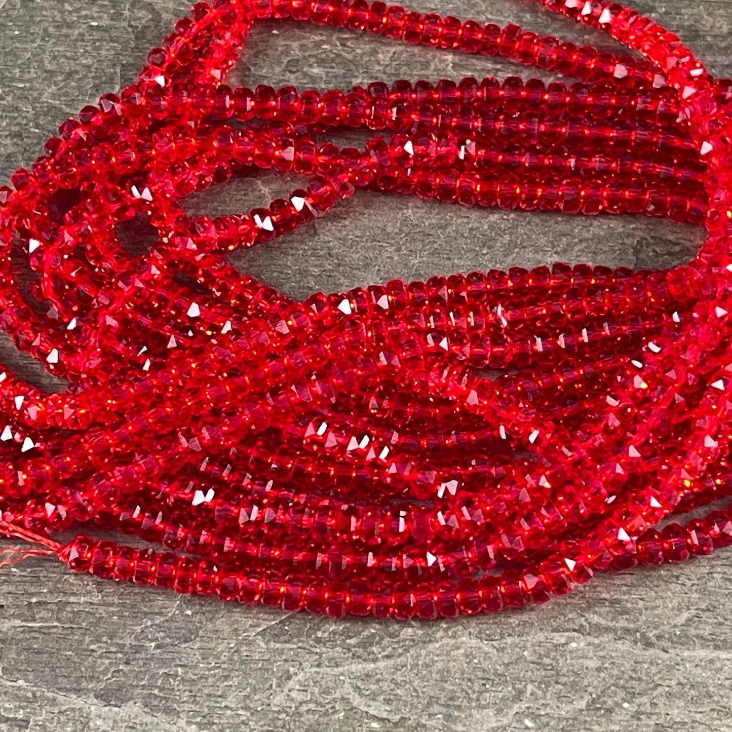 Faceted Glass Beads - 4x2.5mm Heishi Rondelles, Siam Transparent Red (Siam) * 7" Strand