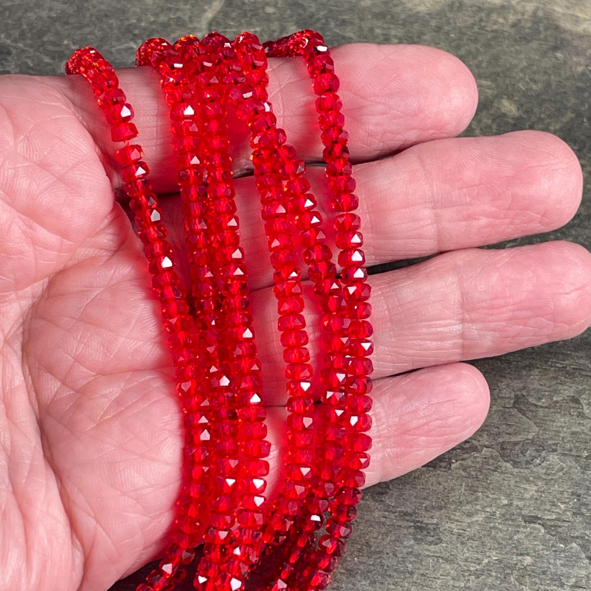 Faceted Glass Beads - 4x2.5mm Heishi Rondelles, Siam Transparent Red (Siam) * 7" Strand