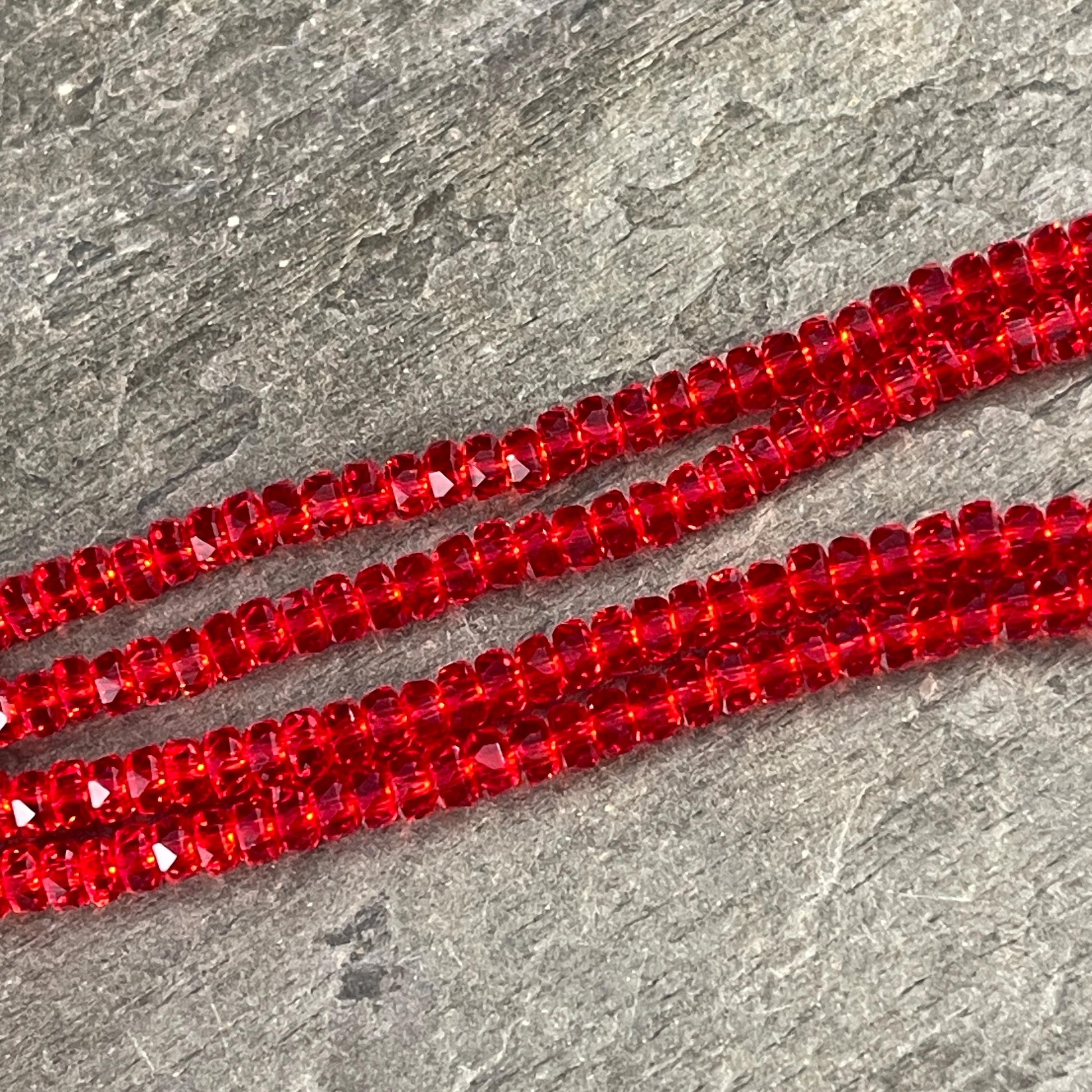 Faceted Glass Beads - 4x2.5mm Heishi Rondelles, Siam Transparent Red (Siam) * 7" Strand