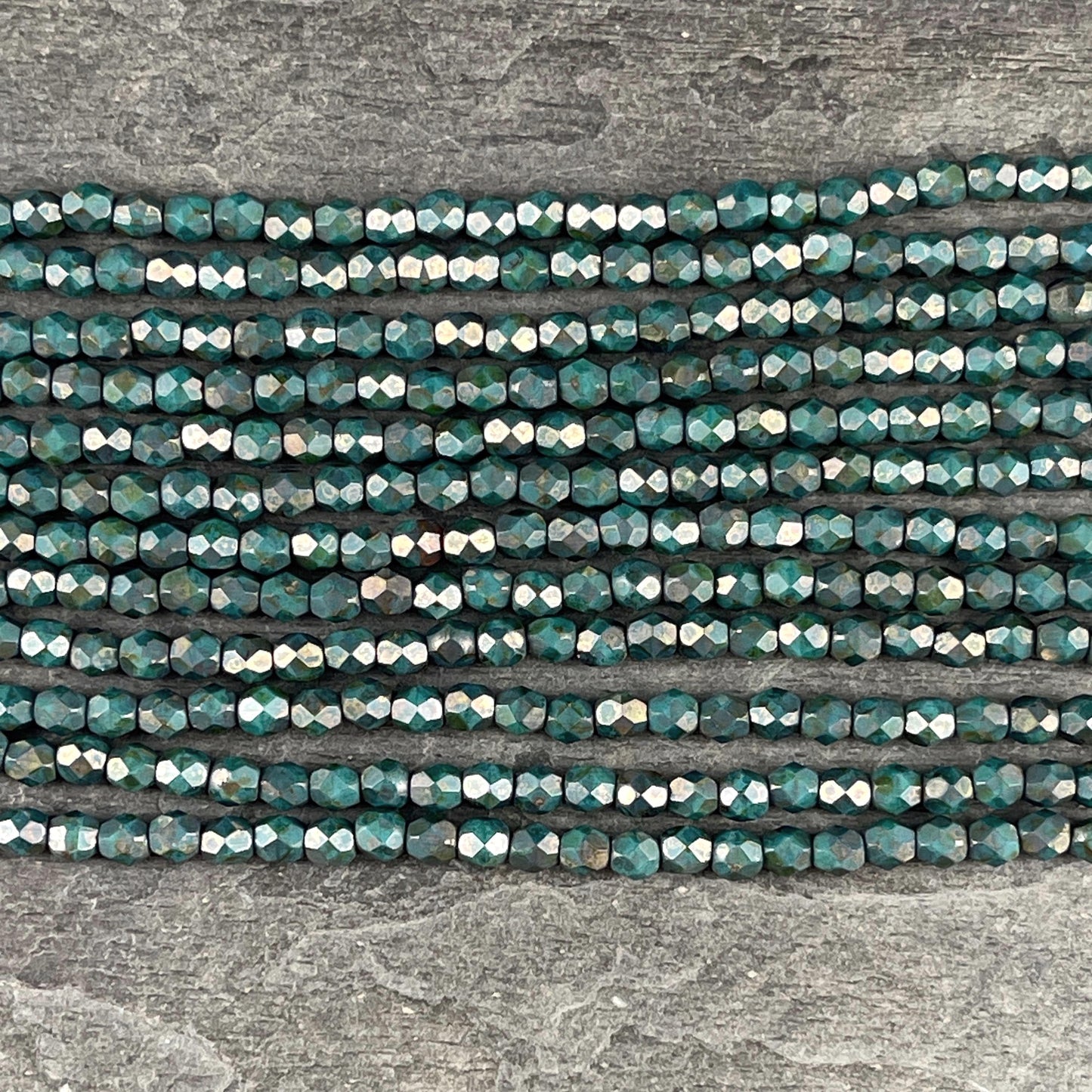 Czech Beads - 4mm Faceted Round Turquoise with Copper Picasso (FP4/SM-CT6315) * Qty. 50