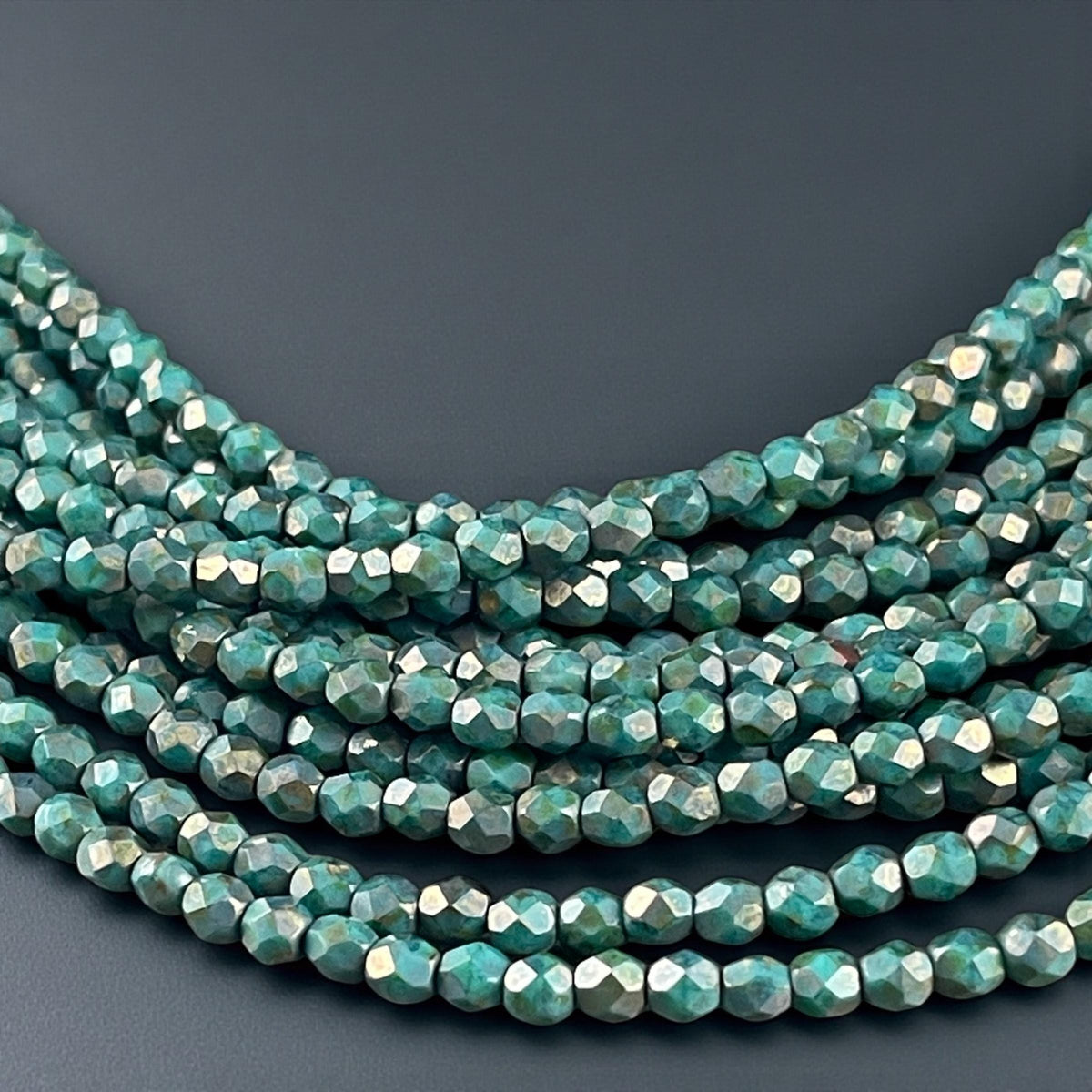 Czech Beads - 4mm Faceted Round Turquoise with Copper Picasso (FP4/SM-CT6315) * Qty. 50