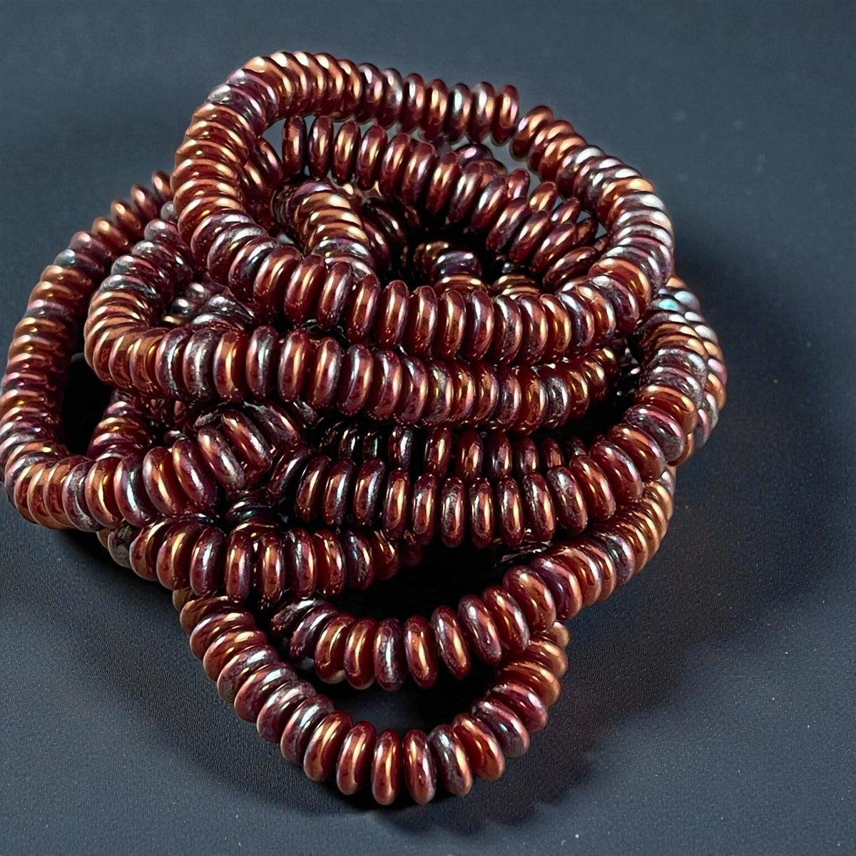 Czech Beads - 6x2mm Heishi Rondelle, Mahogany Red with Purple Blue Luster (DSC/RJ-4757) * Qty. 50