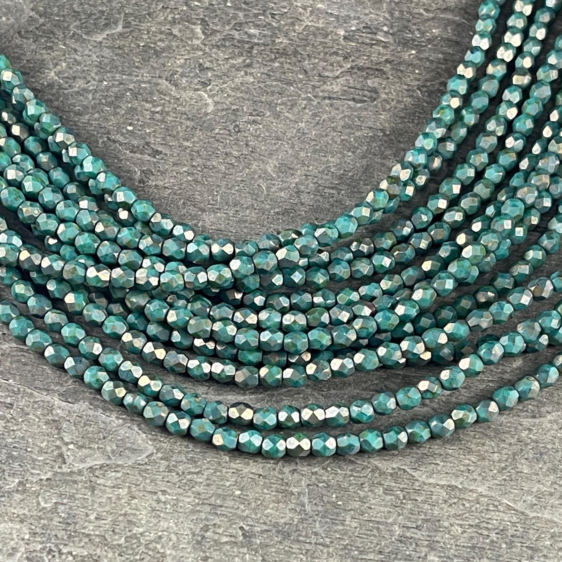 Czech Beads - 4mm Faceted Round Turquoise with Copper Picasso (FP4/SM-CT6315) * Qty. 50