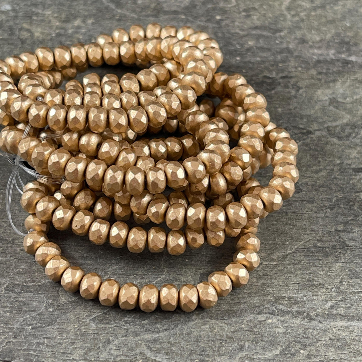Czech Beads - 5x3mm Faceted Rondelle, Satin Metallic Gold (R5/RJ-2826) * Qty. 30