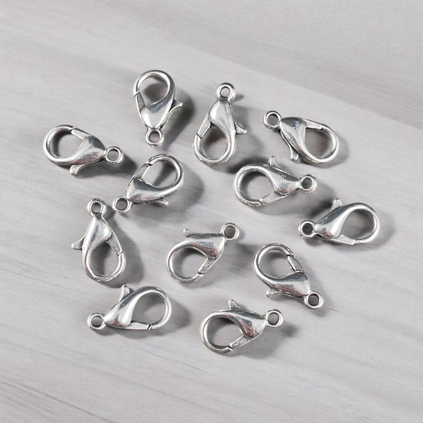 Lobster Clasp, 12x7mm Antiqued Silver Plated (PF/605-12-77) * Qty. 12