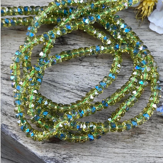 Faceted Glass Beads - 4x2.5mm Heishi Rondelles, Transparent Olive Green with Rainbow AB Finish (Peridot-AB) * 7" Strand