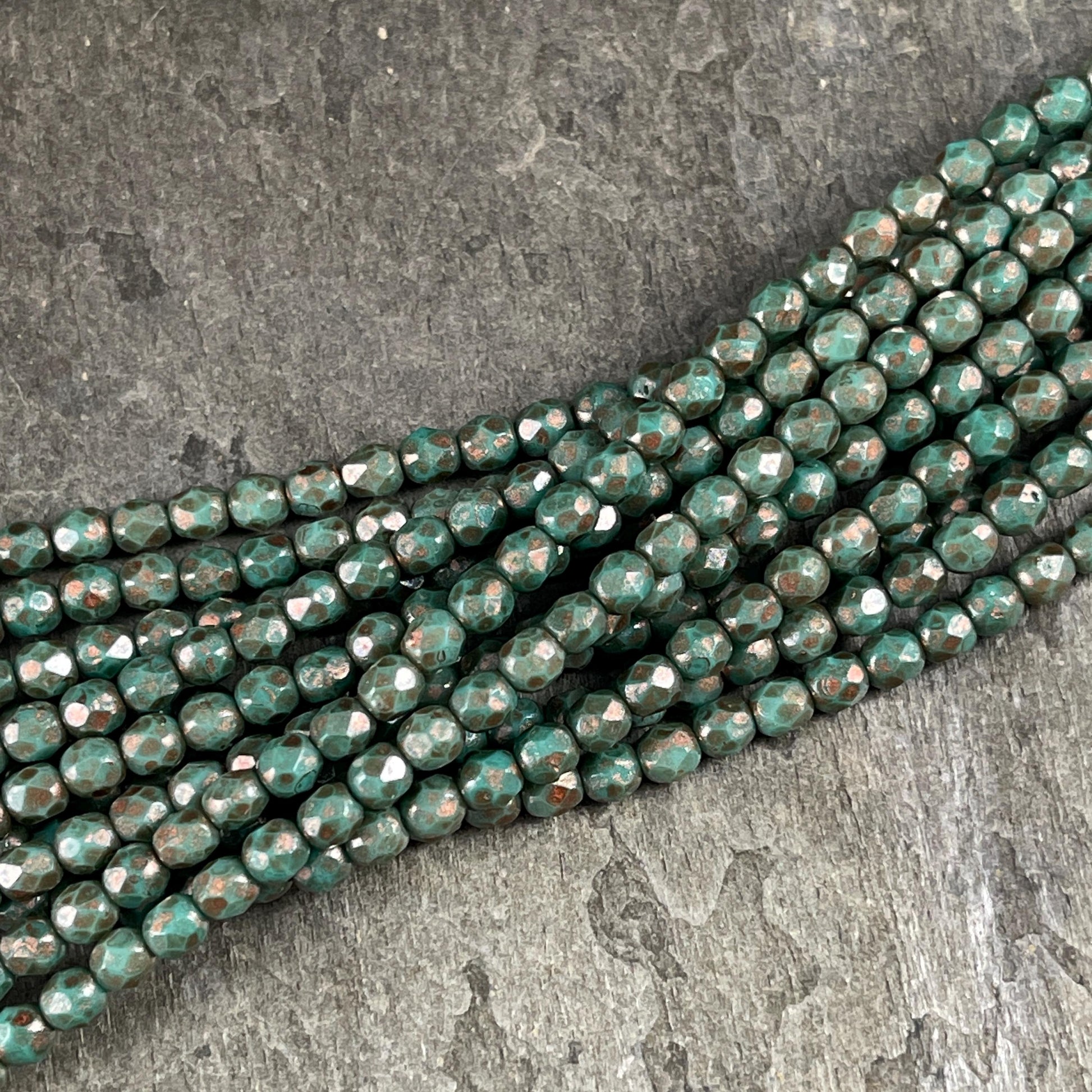 Czech Glass Beads - 4mm Faceted Round, Turquoise Green with Copper Picasso (FP4/TP) * Qty. 50