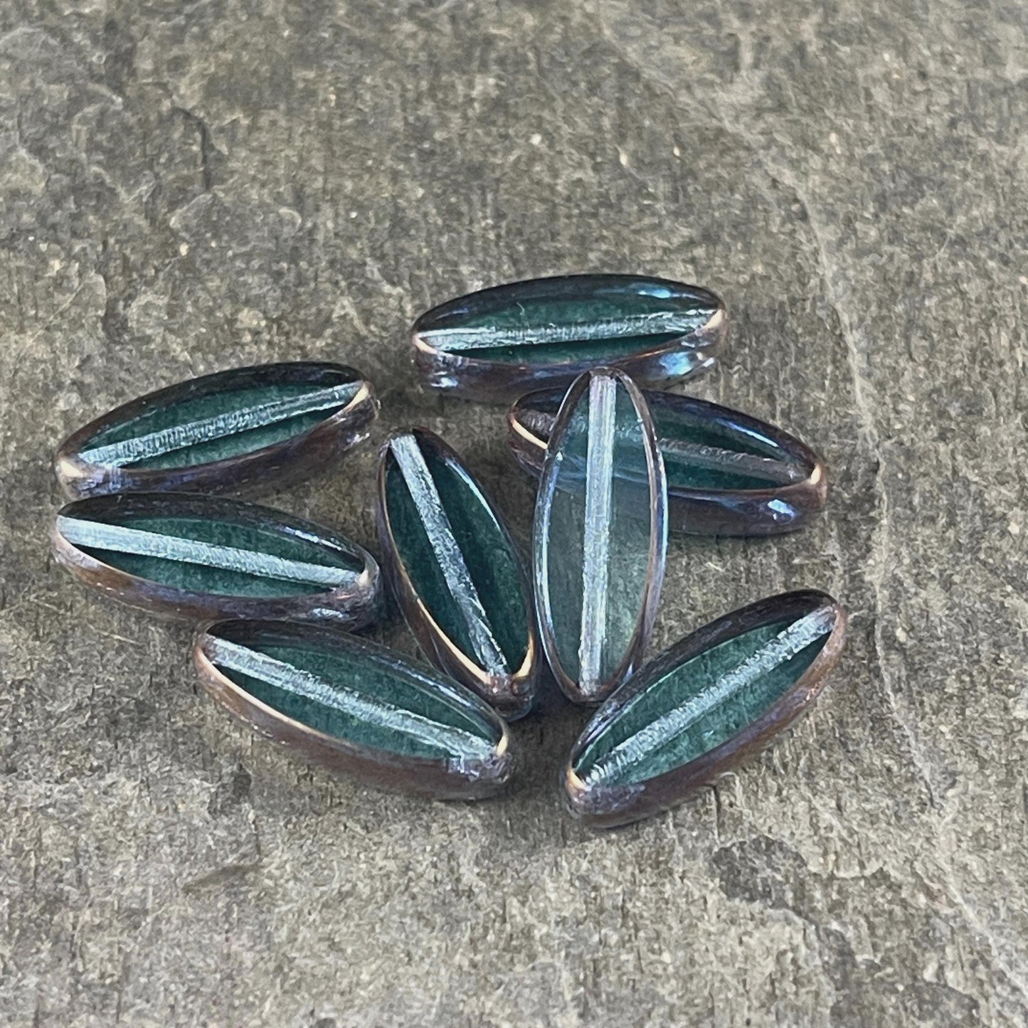 Czech Glass Beads - 16x6mm Table Cut Spindle, Transparent Blue with Bronze Picasso (Spndl-TB) * 8 Beads