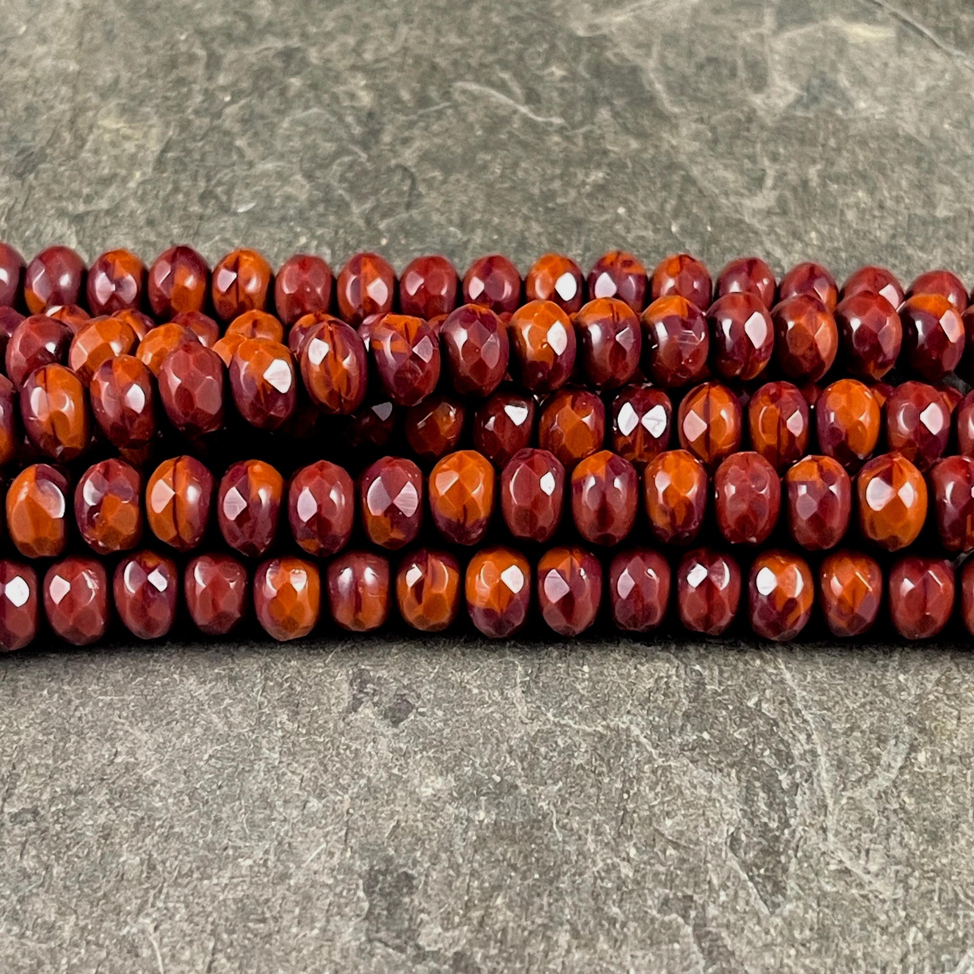 Czech Glass Beads - 7x5mm Faceted Rondelles, Brick Red and Burnt Orange (R7/OB-xRO) * Qty. 21