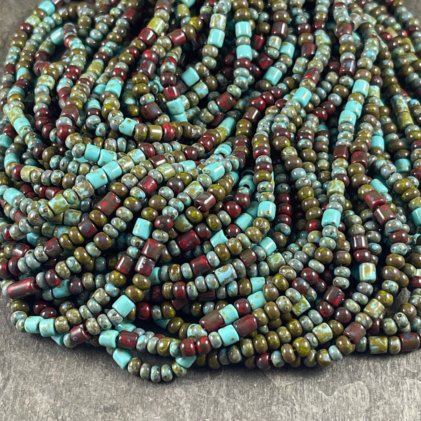 Aged Picasso Beads - 6/0 Czech Glass Mix with Tubes, Olive Green, Turquoise blue and Brick Red Picasso (6/0-DruidBugle) * 20" strand