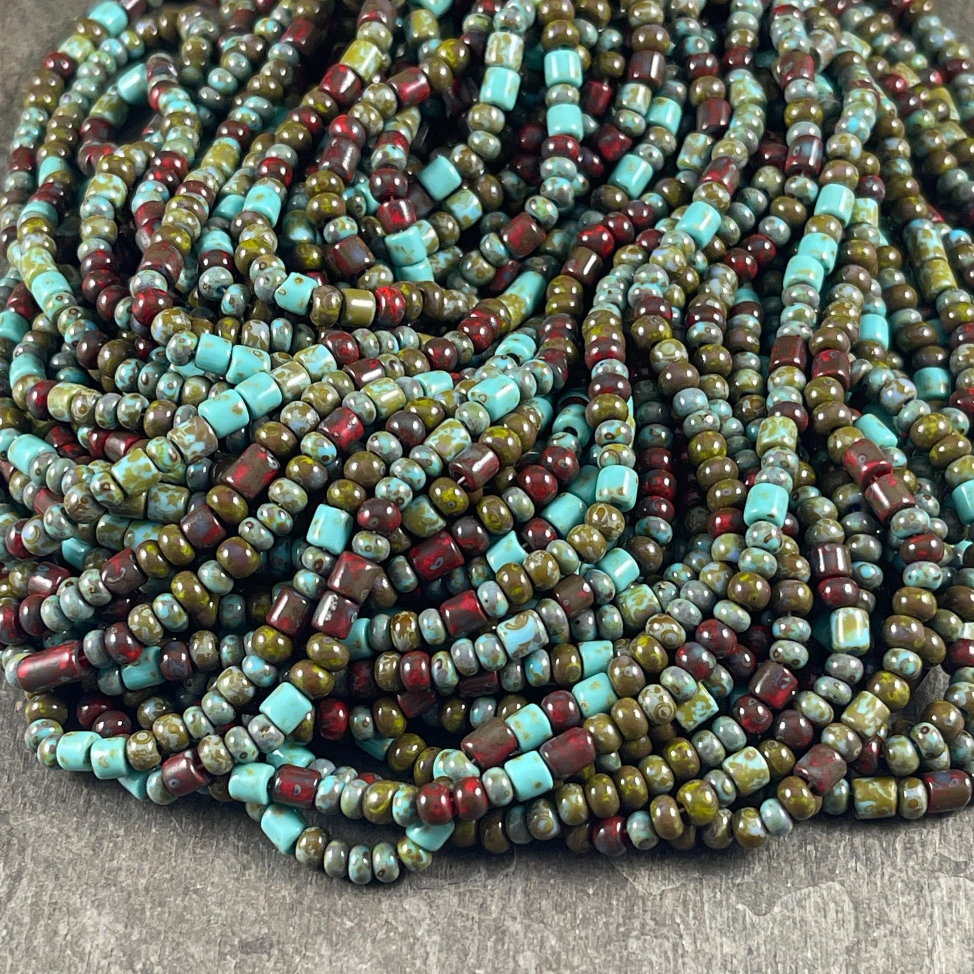 Aged Picasso Beads - 6/0 Czech Glass Mix with Tubes, Olive Green, Turquoise blue and Brick Red Picasso (6/0-DruidBugle) * 20" strand