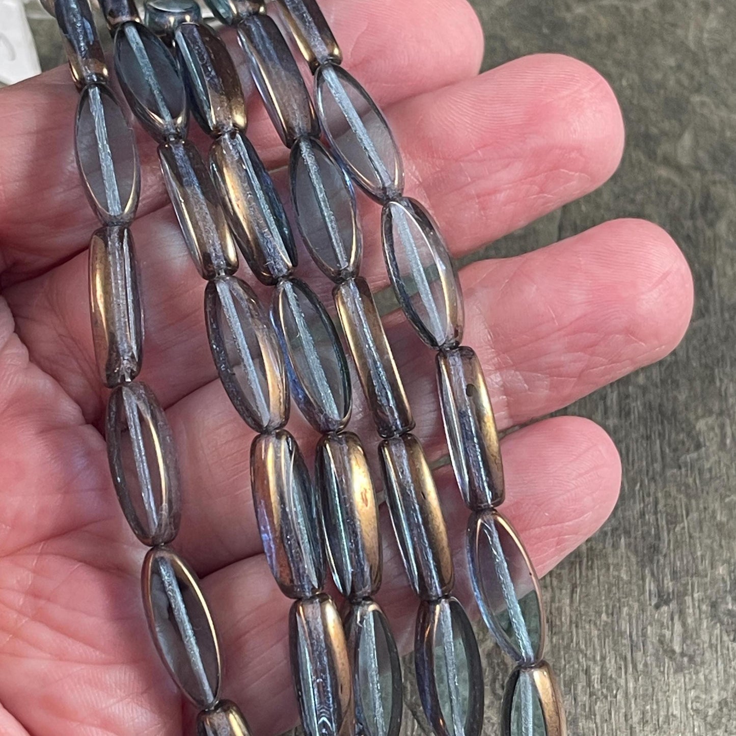 Czech Glass Beads - 16x6mm Table Cut Spindle, Transparent Blue with Bronze Picasso (Spndl-TB) * 8 Beads