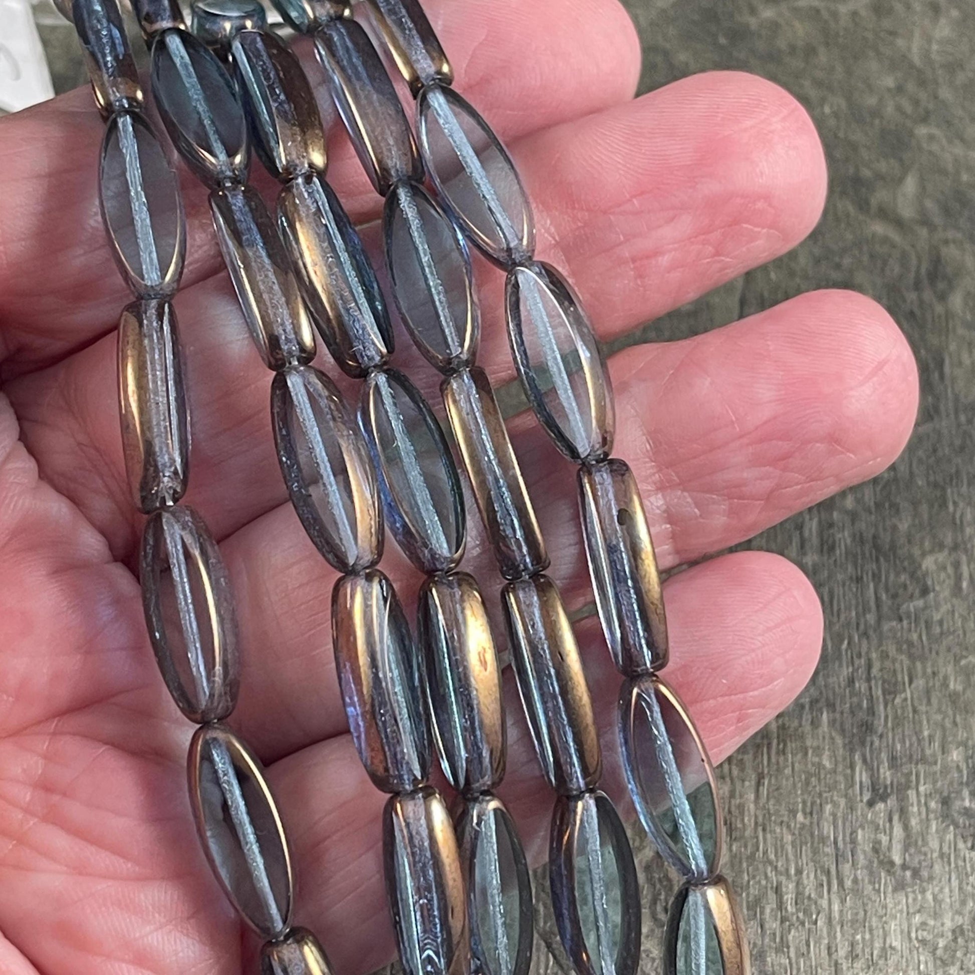 Czech Glass Beads - 16x6mm Table Cut Spindle, Transparent Blue with Bronze Picasso (Spndl-TB) * 8 Beads