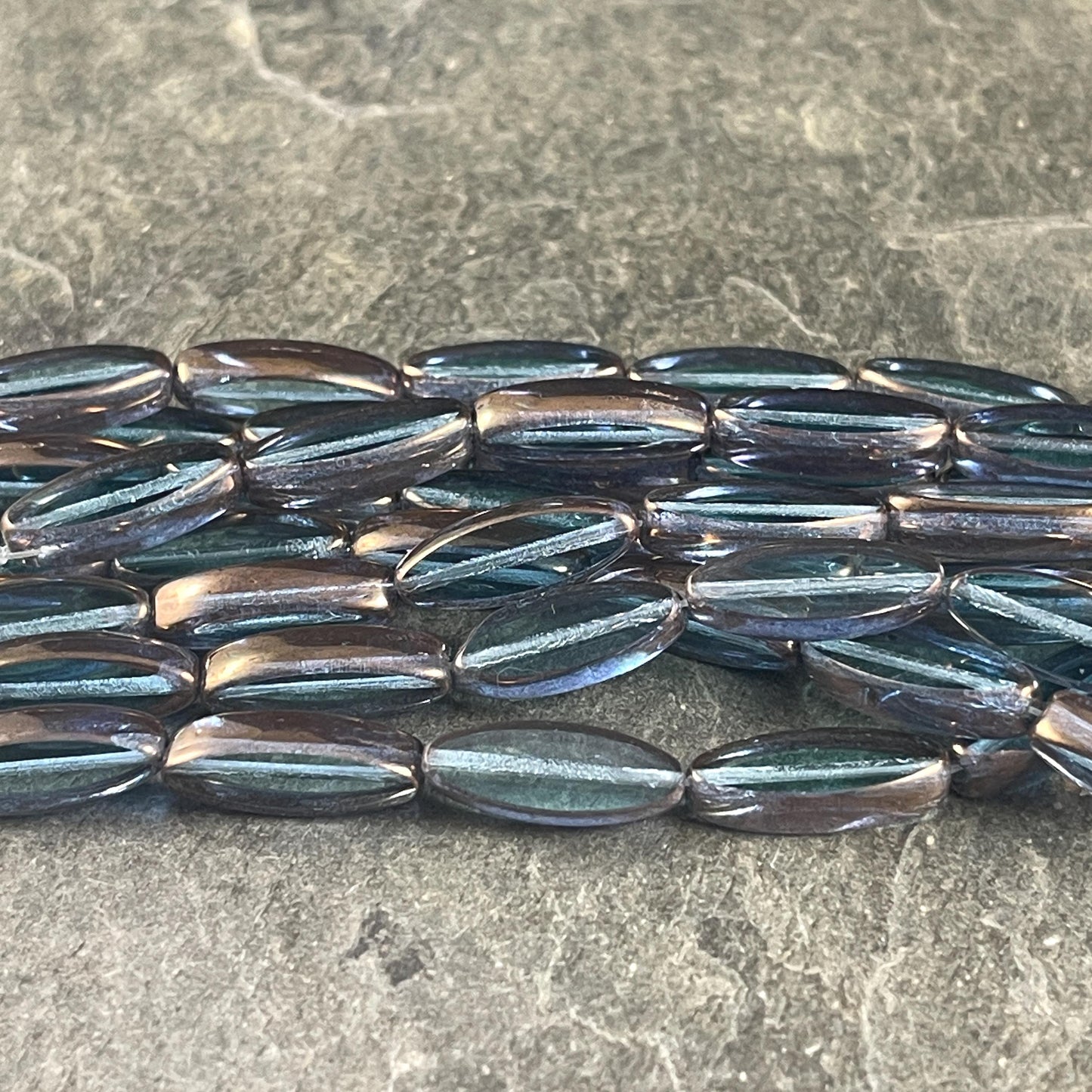 Czech Glass Beads - 16x6mm Table Cut Spindle, Transparent Blue with Bronze Picasso (Spndl-TB) * 8 Beads
