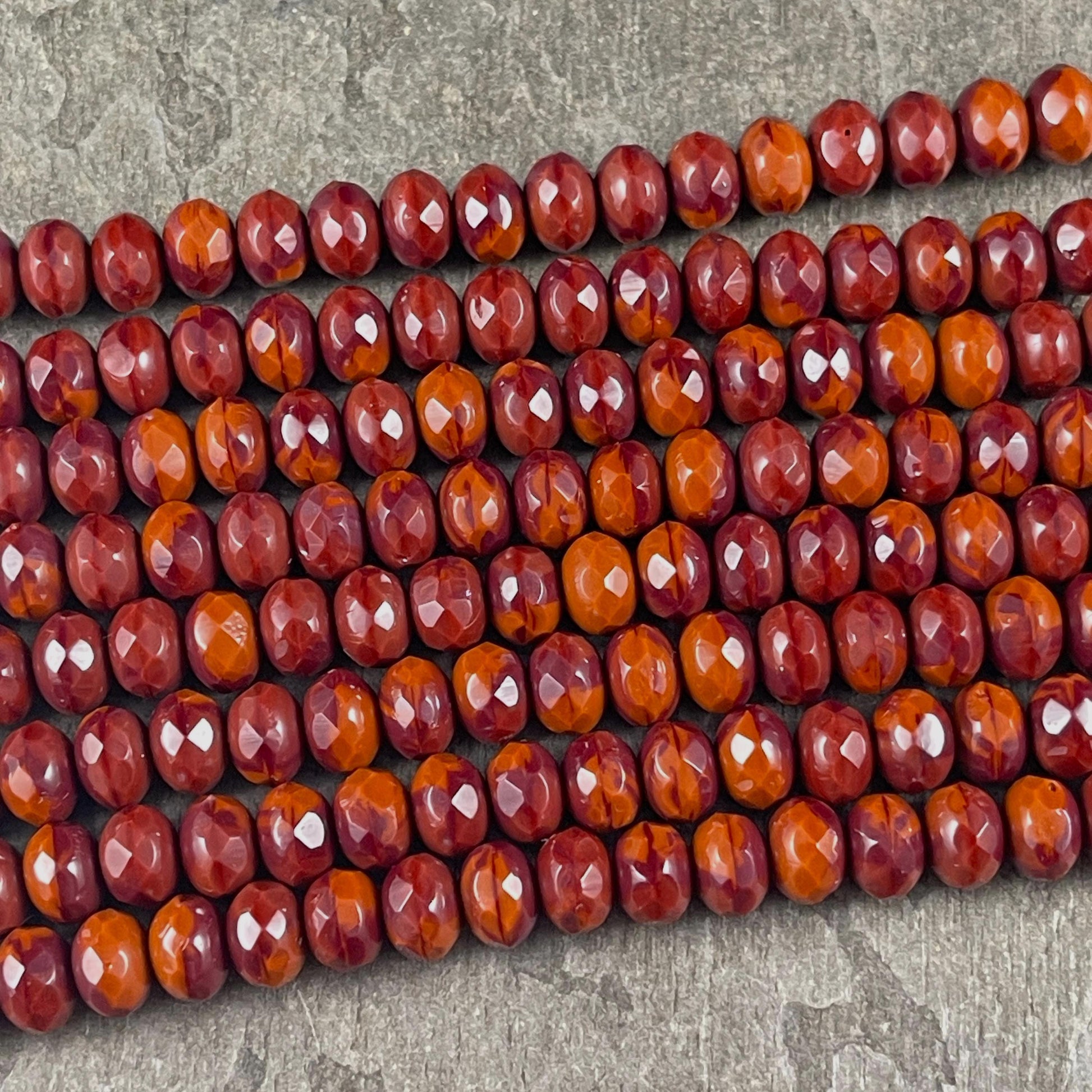 Czech Glass Beads - 7x5mm Faceted Rondelles, Brick Red and Burnt Orange (R7/OB-xRO) * Qty. 21