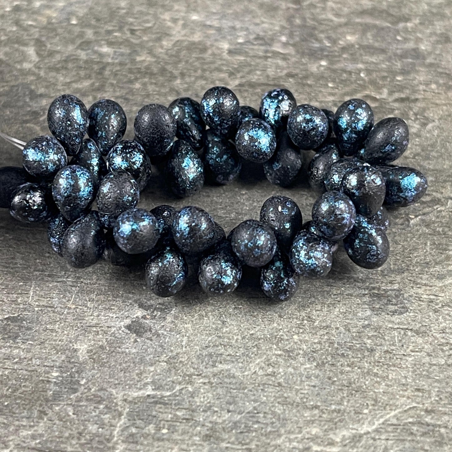 Czech Glass Beads - 7x5mm Briolette Tear Drop, Black with Metallic Blue Wash (DRO/N-0235) * 50 Beads