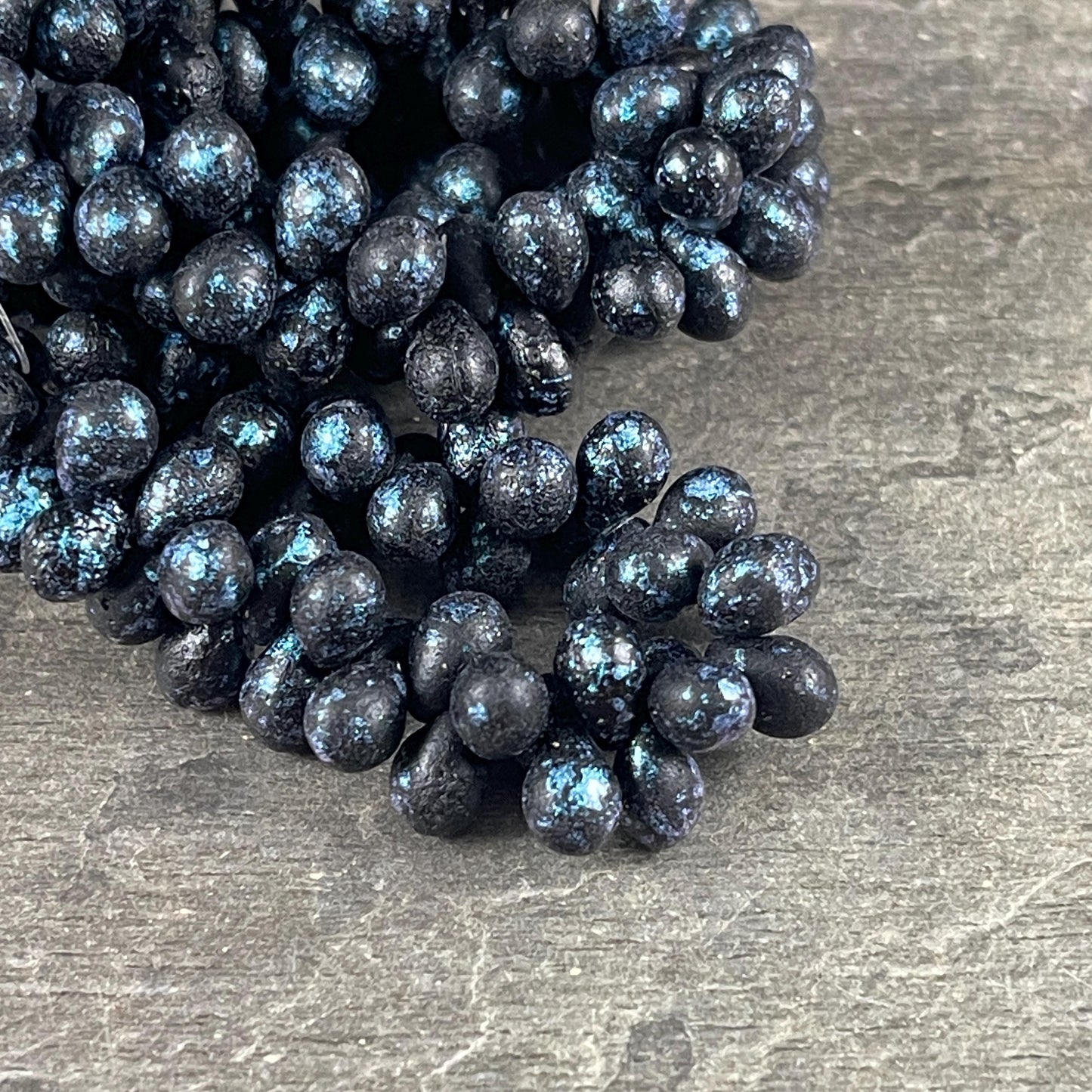 Czech Glass Beads - 7x5mm Briolette Tear Drop, Black with Metallic Blue Wash (DRO/N-0235) * 50 Beads