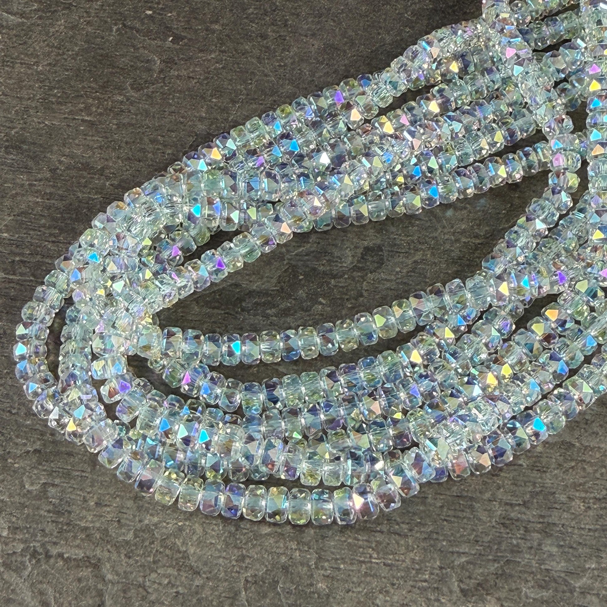 Faceted Glass Beads - 4x2.5mm Heishi Rondelles, Clear with AB Finish (Clear AB) * 7" Strand