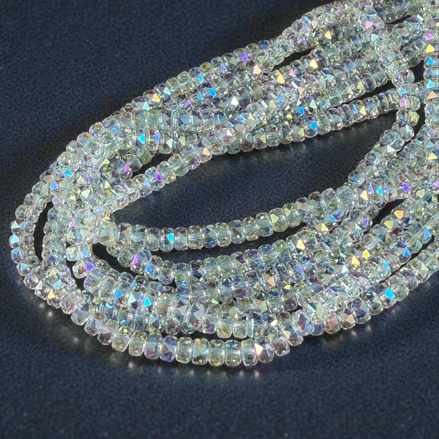Faceted Glass Beads - 4x2.5mm Heishi Rondelles, Clear with AB Finish (Clear AB) * 7" Strand