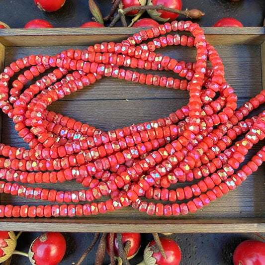 Faceted Glass Beads - 4x2.5mm Heishi Rondelles, Opaque Coral AB (Coral-AB) * 7" Strand