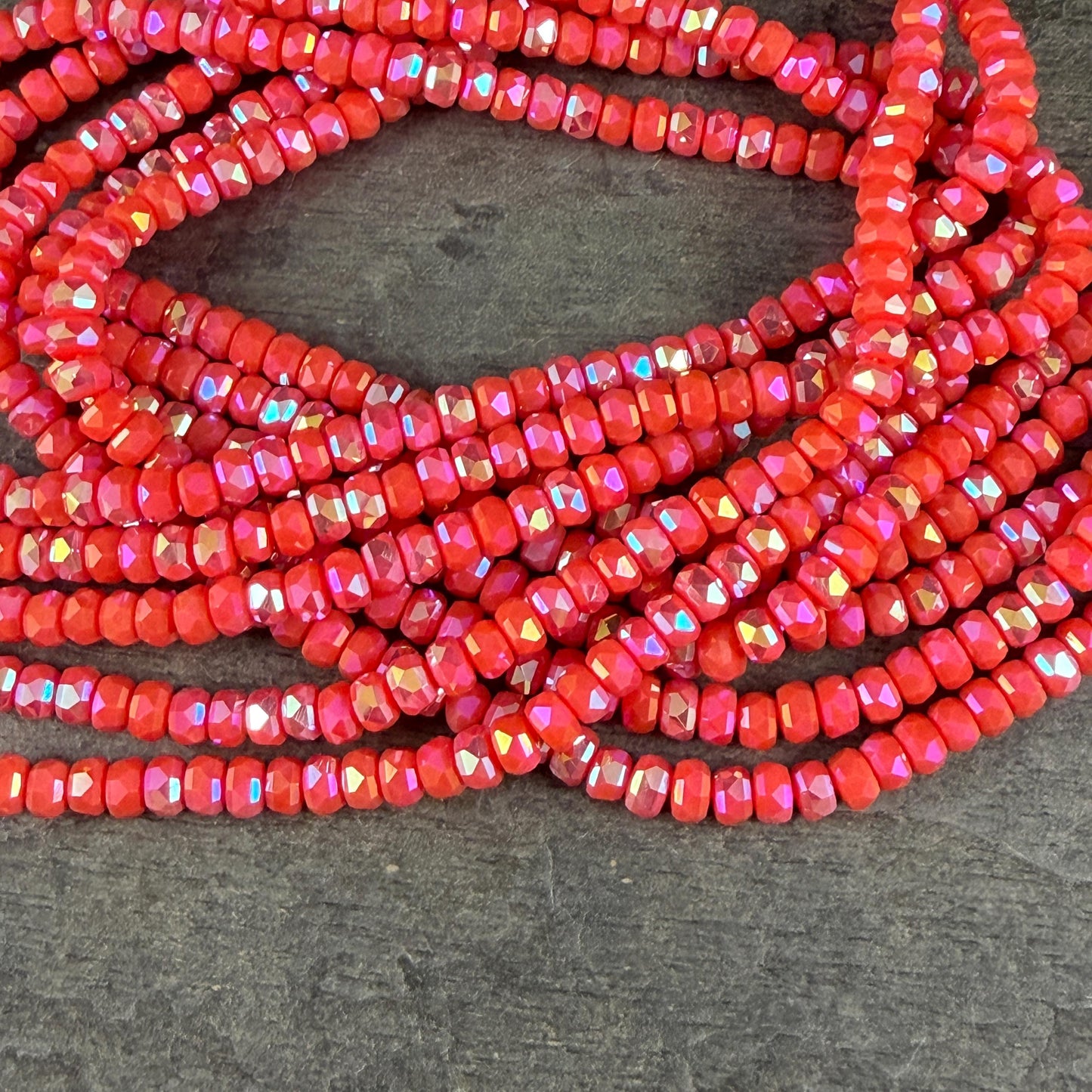 Faceted Glass Beads - 4x2.5mm Heishi Rondelles, Opaque Coral AB (Coral-AB) * 7" Strand