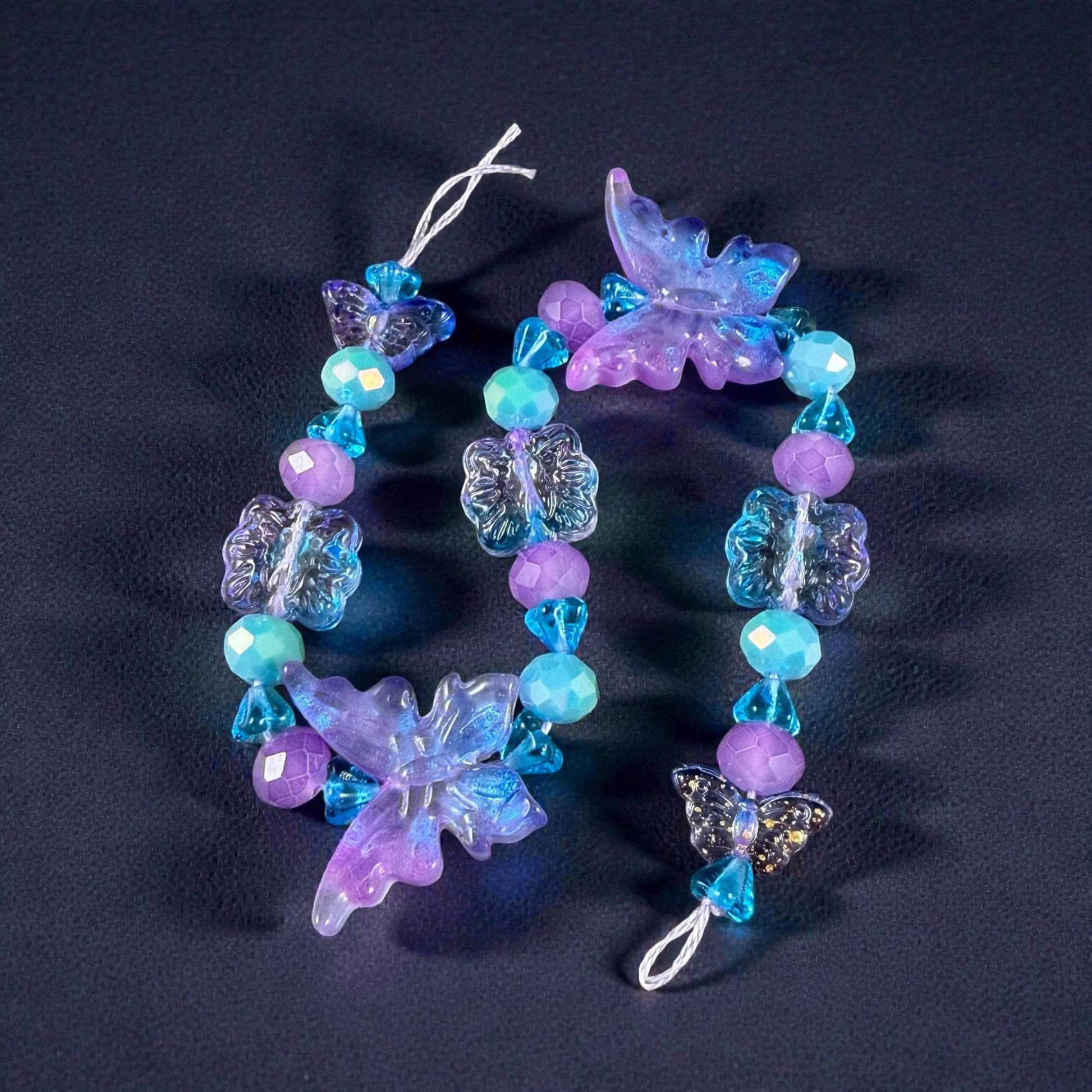 Butterfly Beads, Electric Lavender and Aqua, Glass Butterflies and Flowers (DZ-526.23) * 8" Strand 31 Beads