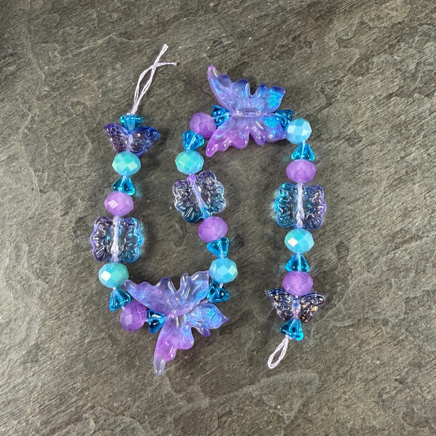 Butterfly Beads, Electric Lavender and Aqua, Glass Butterflies and Flowers (DZ-526.23) * 8" Strand 31 Beads