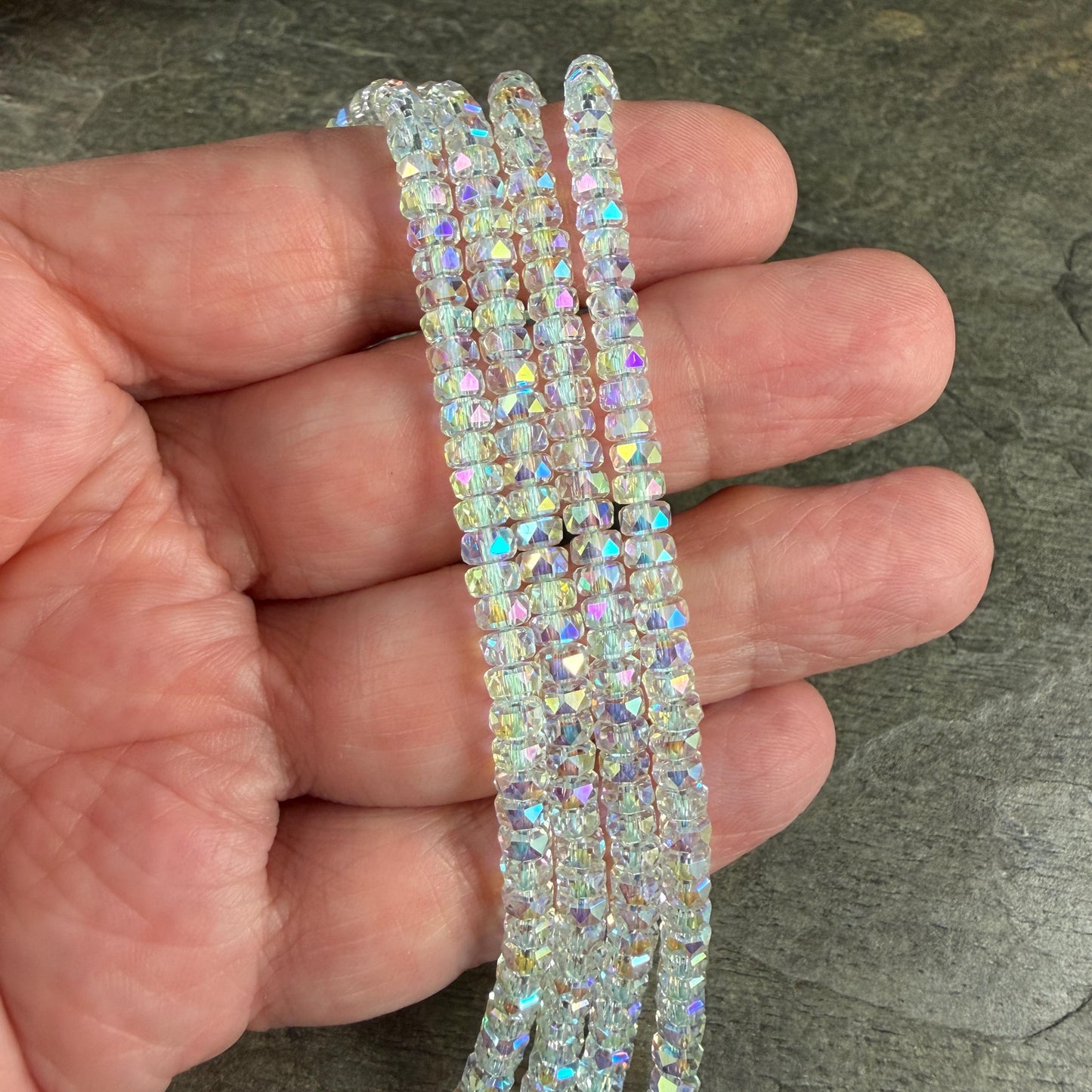 Faceted Glass Beads - 4x2.5mm Heishi Rondelles, Clear with AB Finish (Clear AB) * 7" Strand
