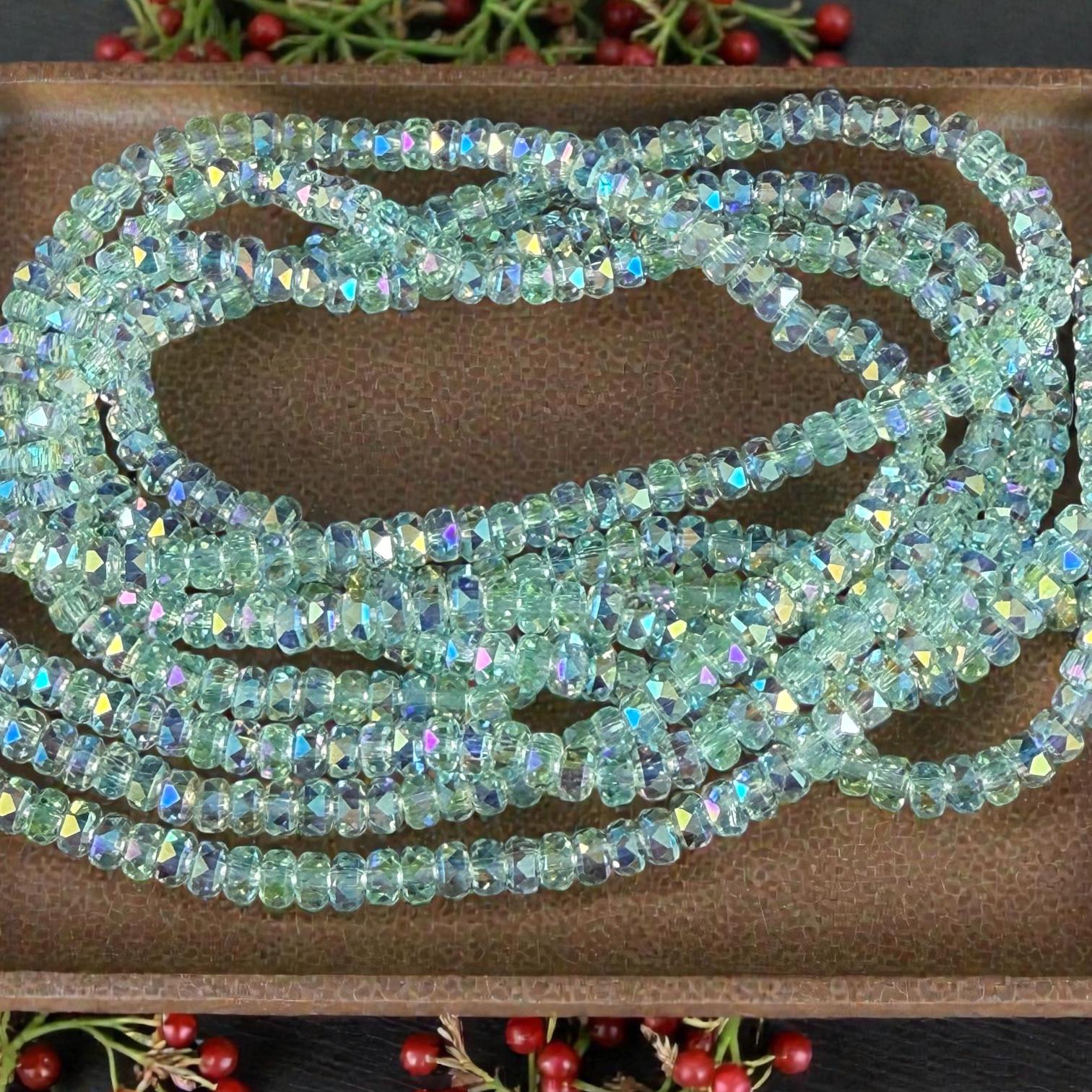 Faceted Glass Beads - 4x2.5mm Heishi Rondelles, Very Light Green with AB Finish (LtGreenAB) * 7" Strand