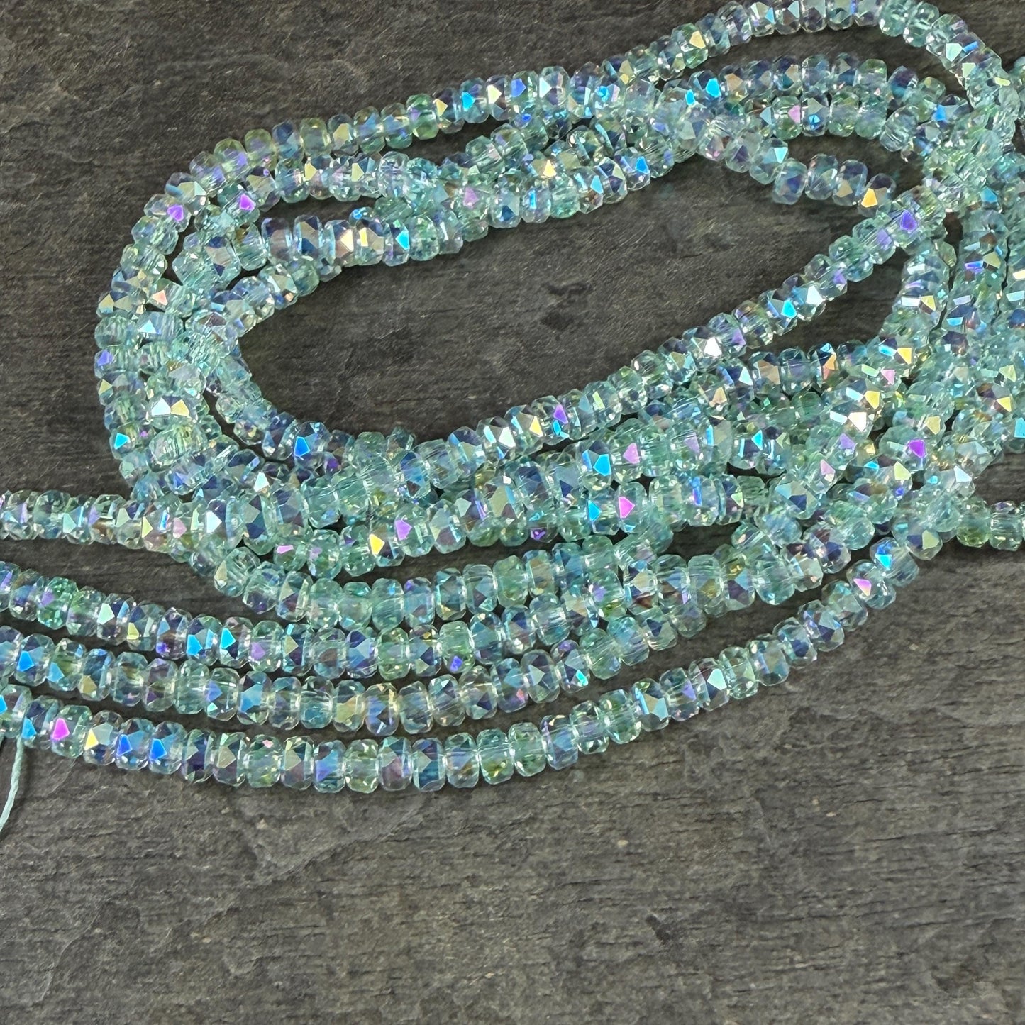 Faceted Glass Beads - 4x2.5mm Heishi Rondelles, Very Light Green with AB Finish (LtGreenAB) * 7" Strand