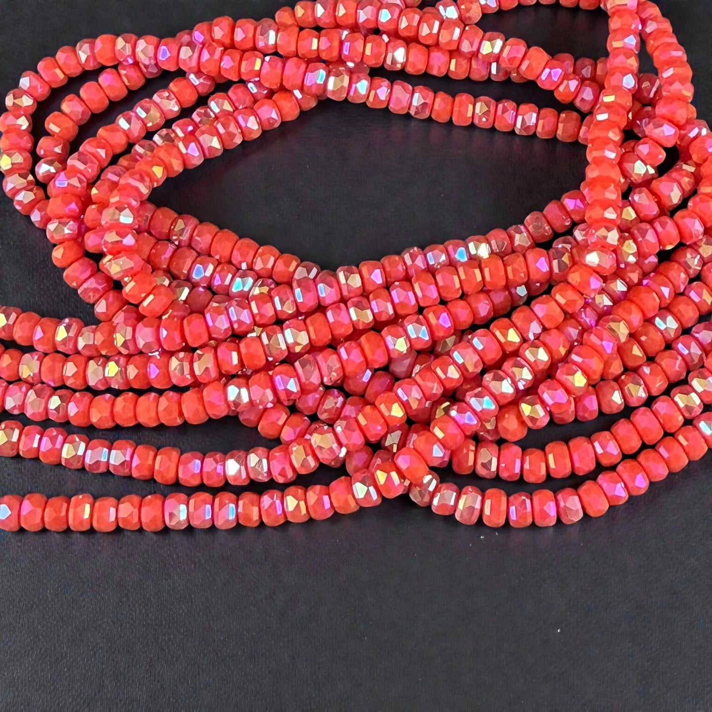 Faceted Glass Beads - 4x2.5mm Heishi Rondelles, Opaque Coral AB (Coral-AB) * 7" Strand
