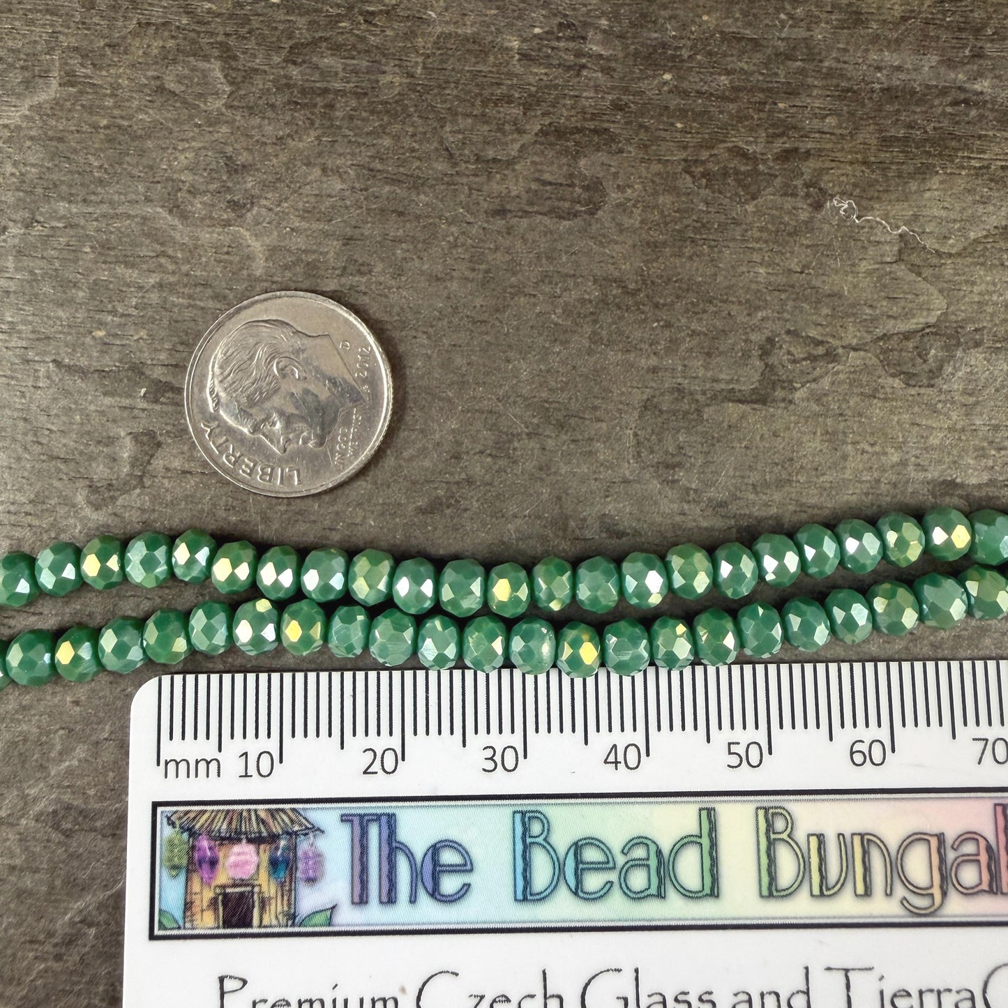 4.5x3.5mm Faceted Glass Beads, Opaque Spring Green with AB Finish (SprGreenAB-4) * 12" Strand