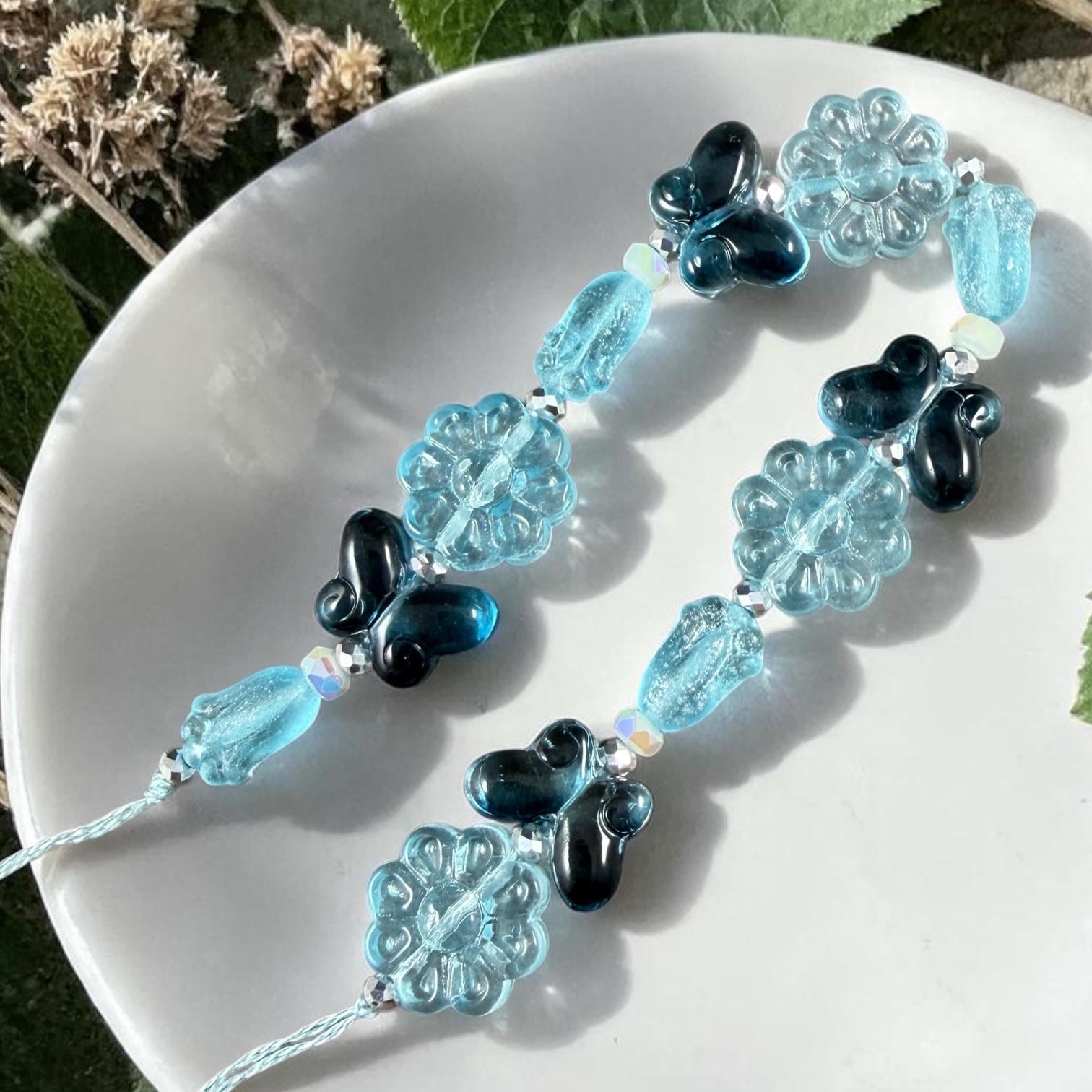 Exclusive Bead Bungalow Mix - Blue Butterflies and Flowers, Nature Theme Glass Beads (612.03) - 6.5" Strand