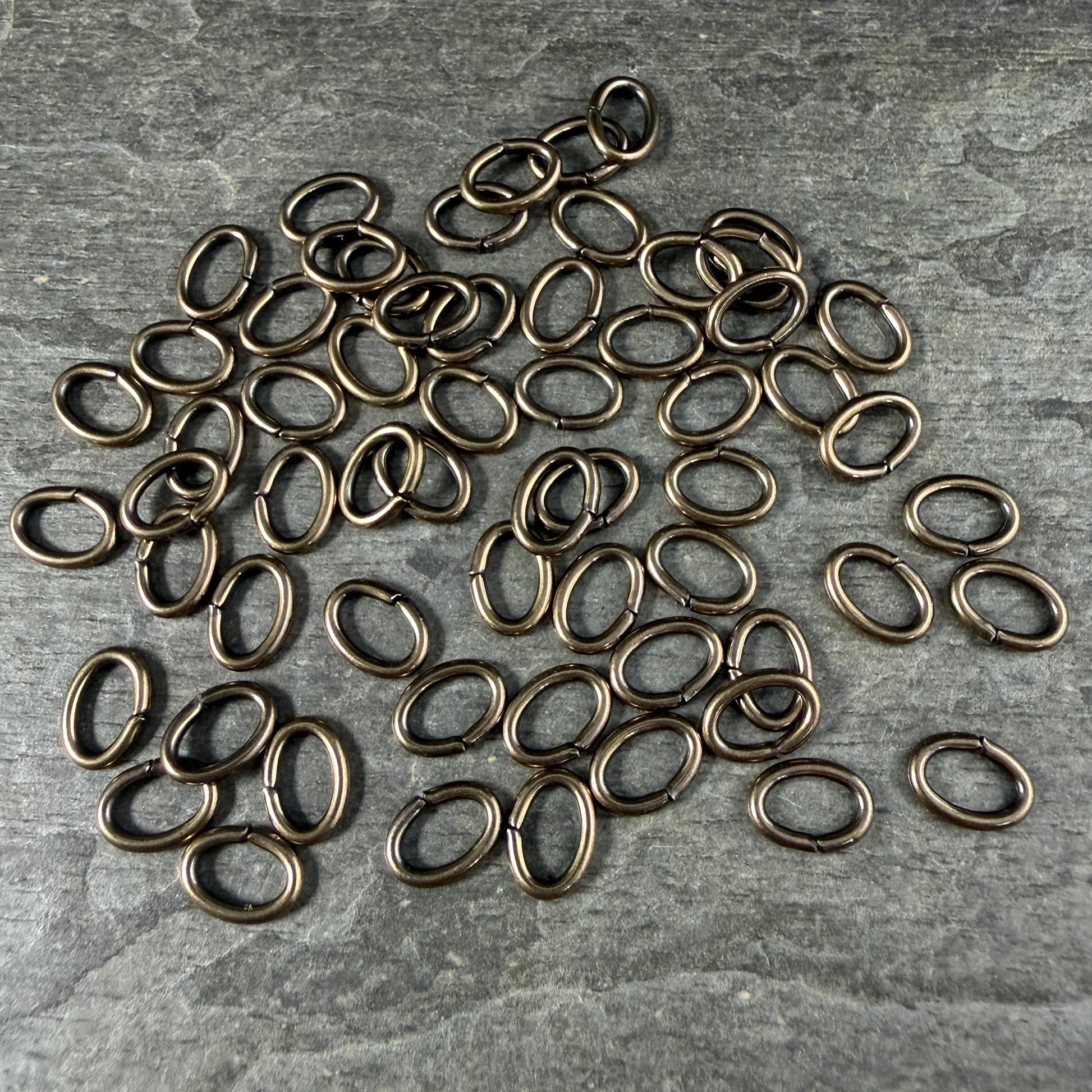 8x6mm Oval Jump Rings, 16g Open, Antiqued Brass (FMG/5083) * Qty. 50