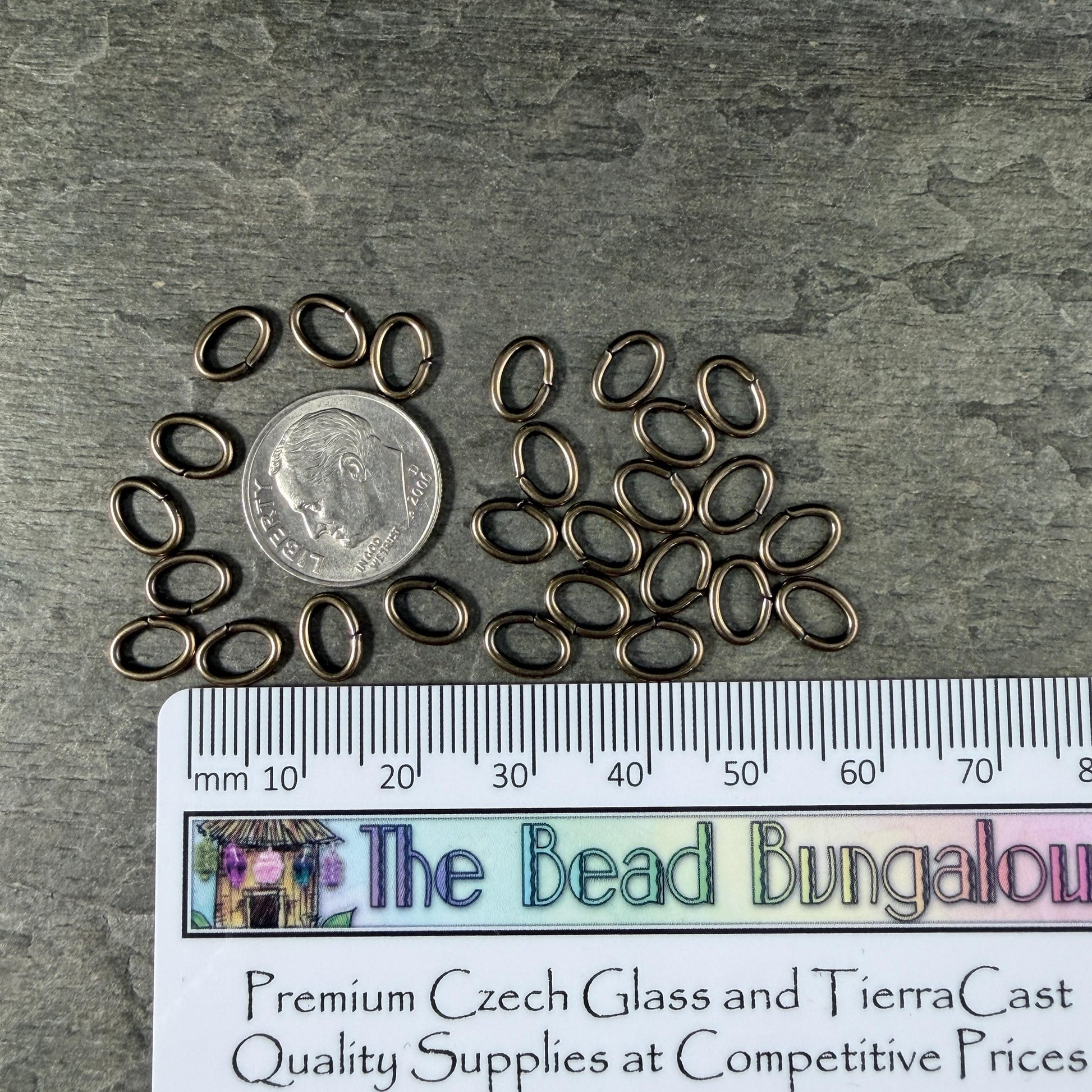 8x6mm Oval Jump Rings, 16g Open, Antiqued Brass (FMG/5083) * Qty. 50
