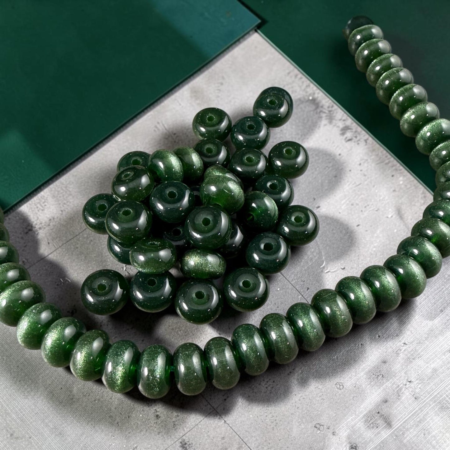 Glass Beads - 8x5mm Rondelles, Dark Forest Green Cat's Eye * 7" Strand