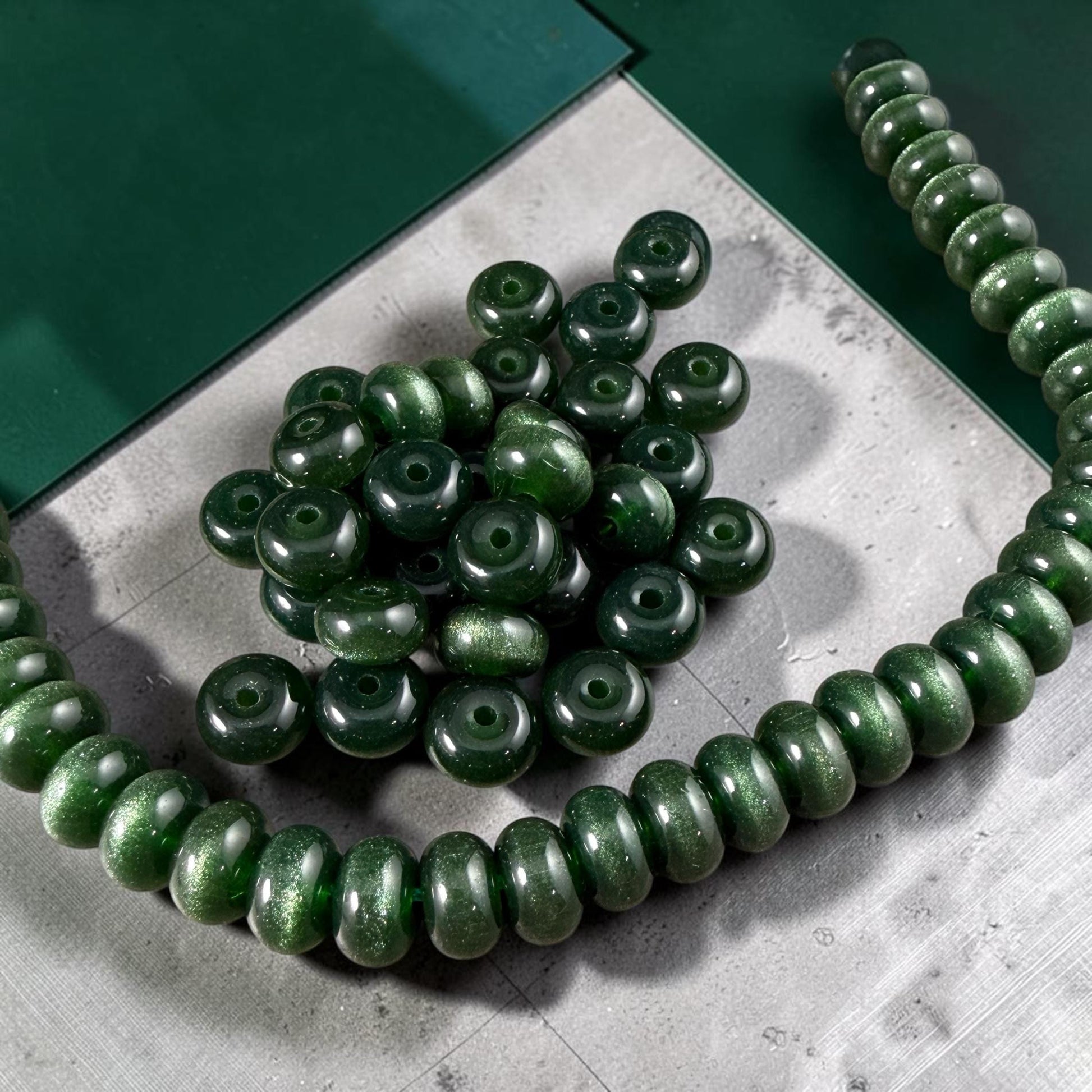 Glass Beads - 8x5mm Rondelles, Dark Forest Green Cat's Eye * 7" Strand