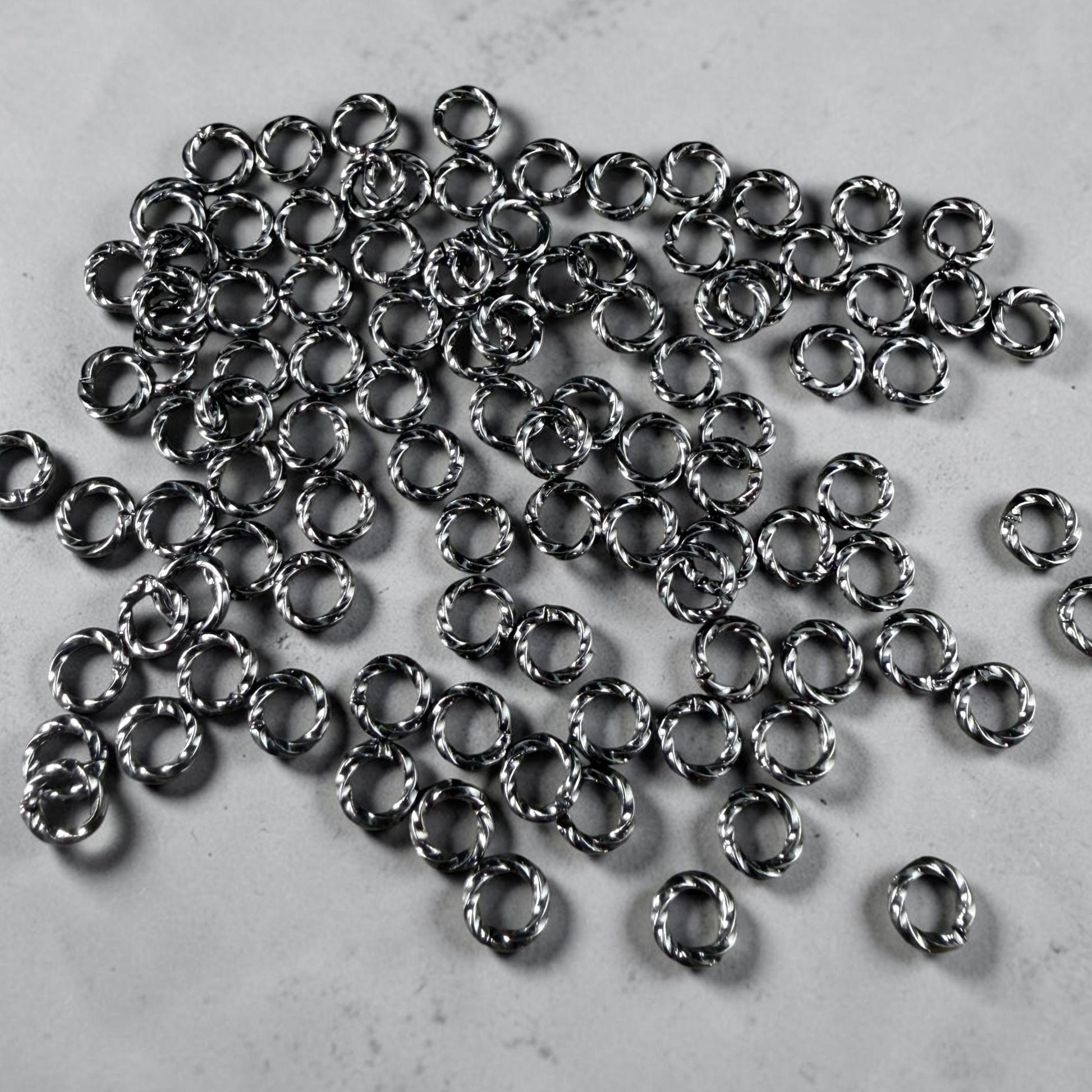 6mm Twisted Jump Rings, 16g Open, Gunmetal Black Plated Brass (FMG/5046) * Qty. 100