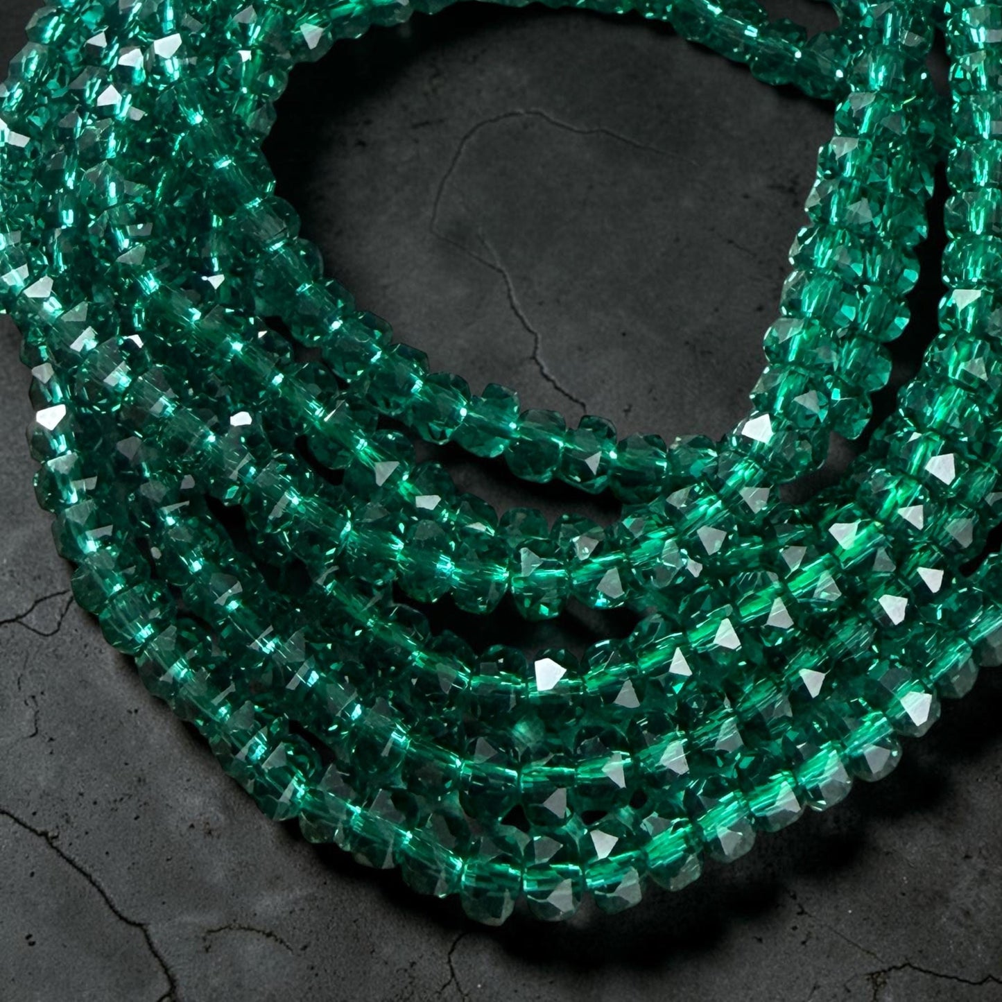 Faceted Glass Beads - 4x2.5mm Heishi Rondelles, Transparent Emerald Green (C539) * 8" Strand
