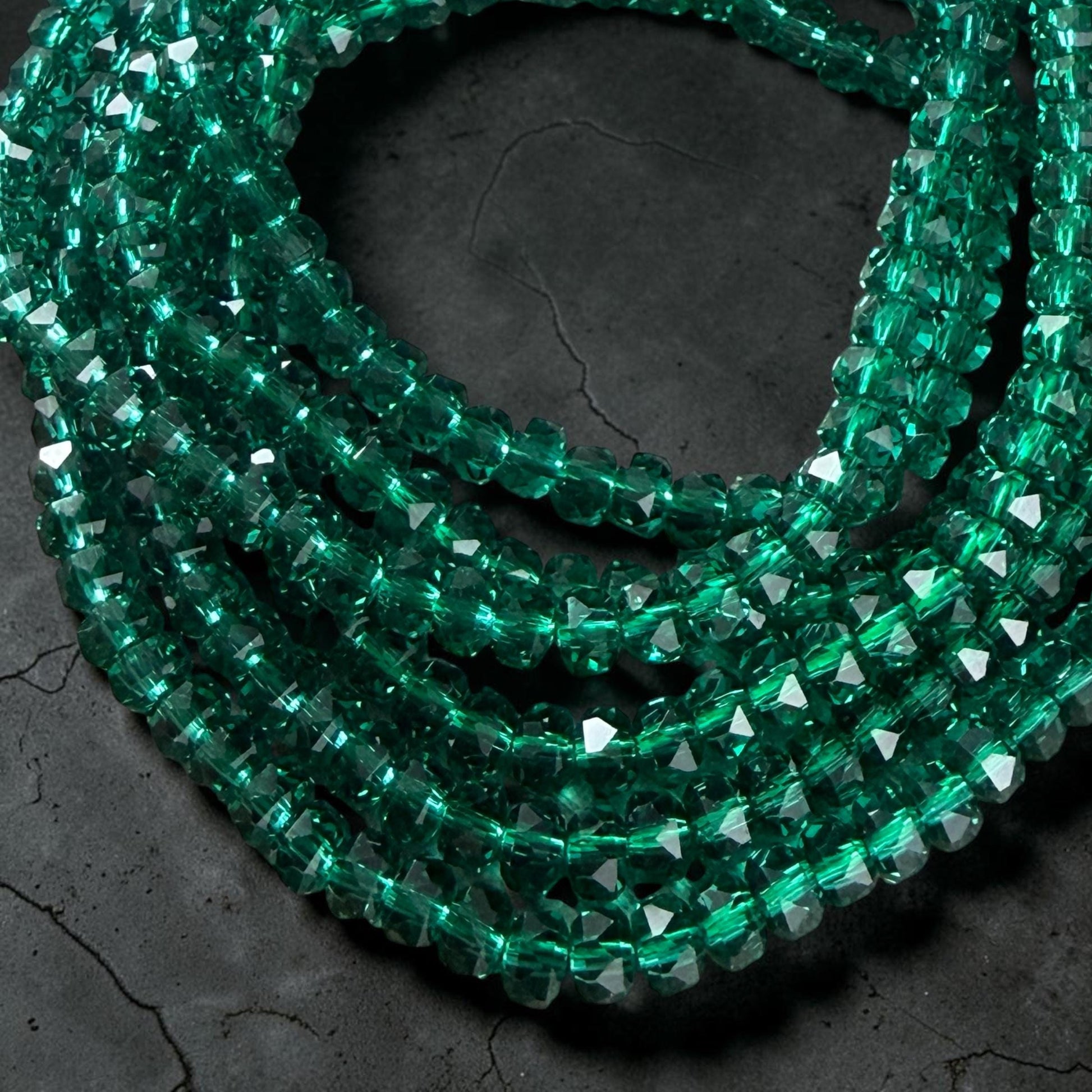 Faceted Glass Beads - 4x2.5mm Heishi Rondelles, Transparent Emerald Green (C539) * 8" Strand