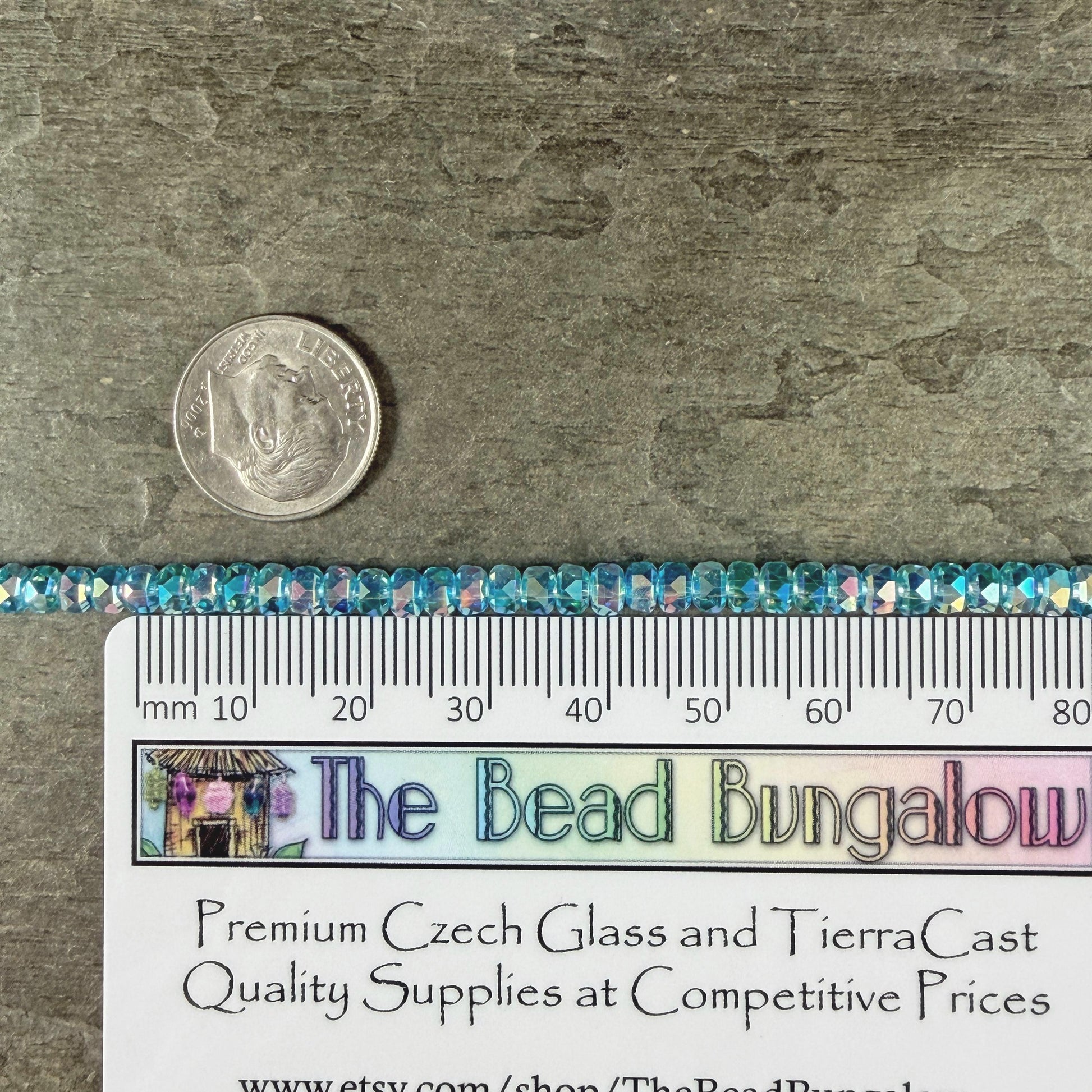 Faceted Glass Beads - 4x2.5mm Heishi Rondelles, Transparent Turquoise with Rainbow AB Finish (C12-AB) * 8" Strand