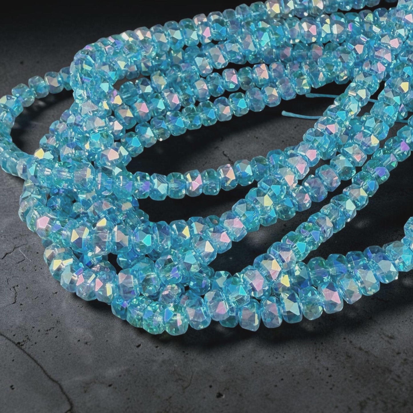 Faceted Glass Beads - 4x2.5mm Heishi Rondelles, Transparent Turquoise with Rainbow AB Finish (C12-AB) * 8" Strand