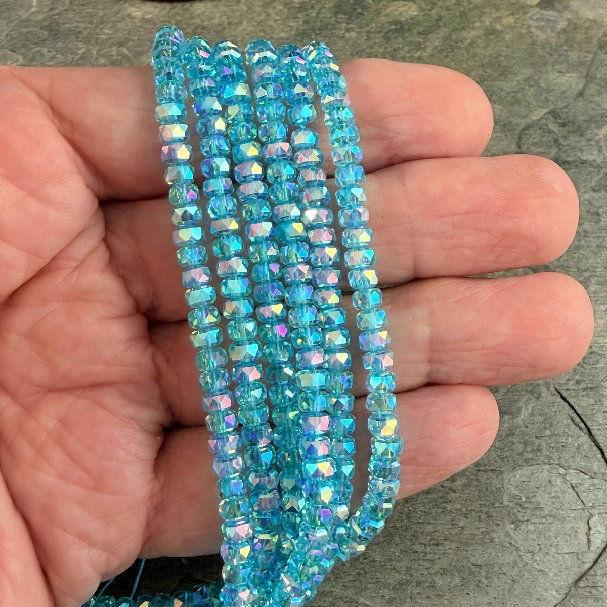 Faceted Glass Beads - 4x2.5mm Heishi Rondelles, Transparent Turquoise with Rainbow AB Finish (C12-AB) * 8" Strand