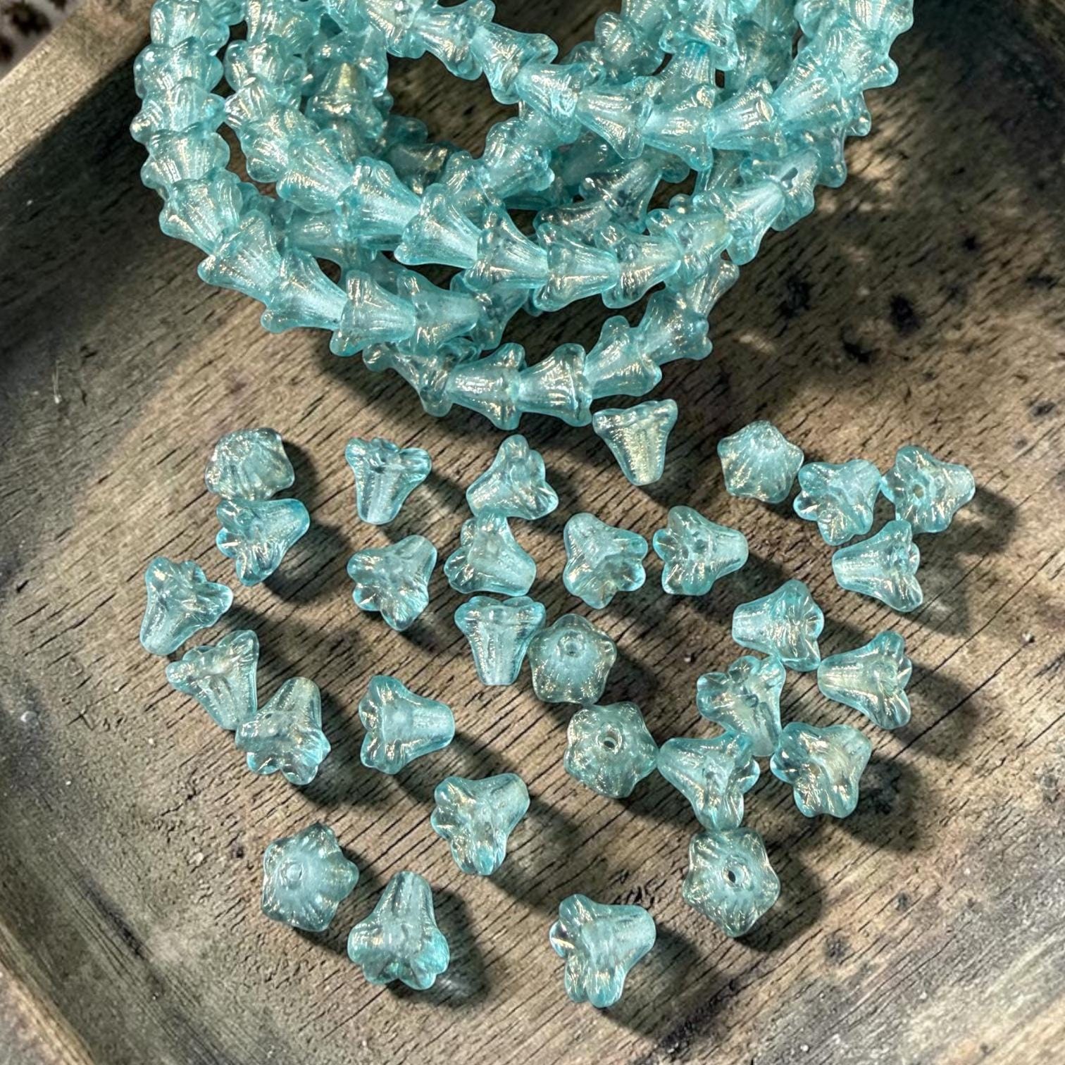 Czech Beads - 5x6mm Small Trumpet Bell Flower, Transparent Aqua Blue (FLO/N-2288) * 30 Beads