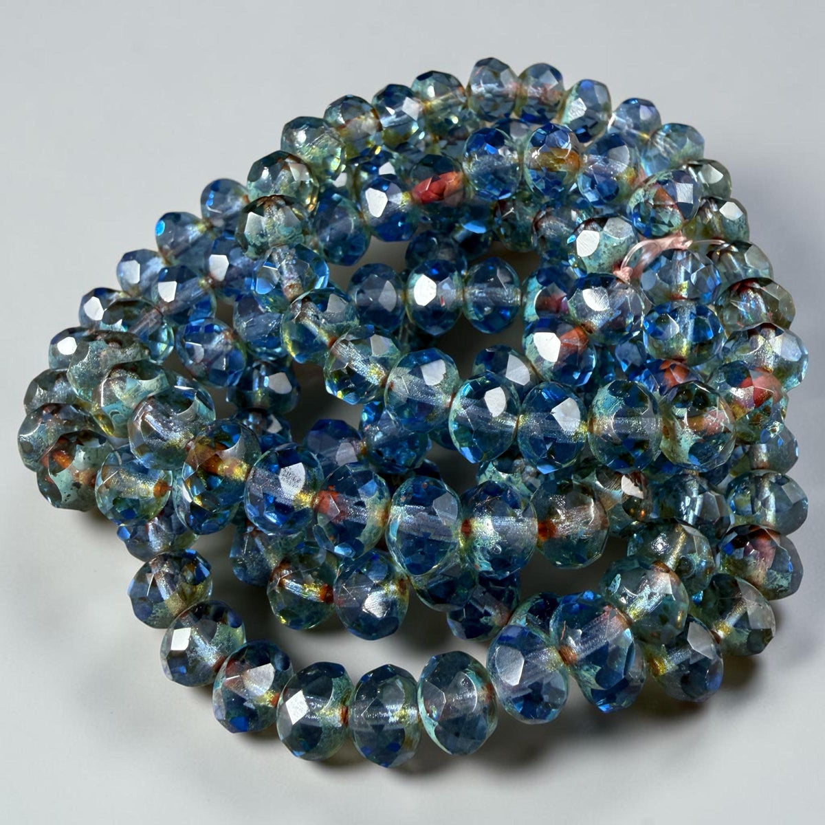 8x6mm Transparent Light Sapphire Blue Picasso Faceted Rondelles (R8/0577) *