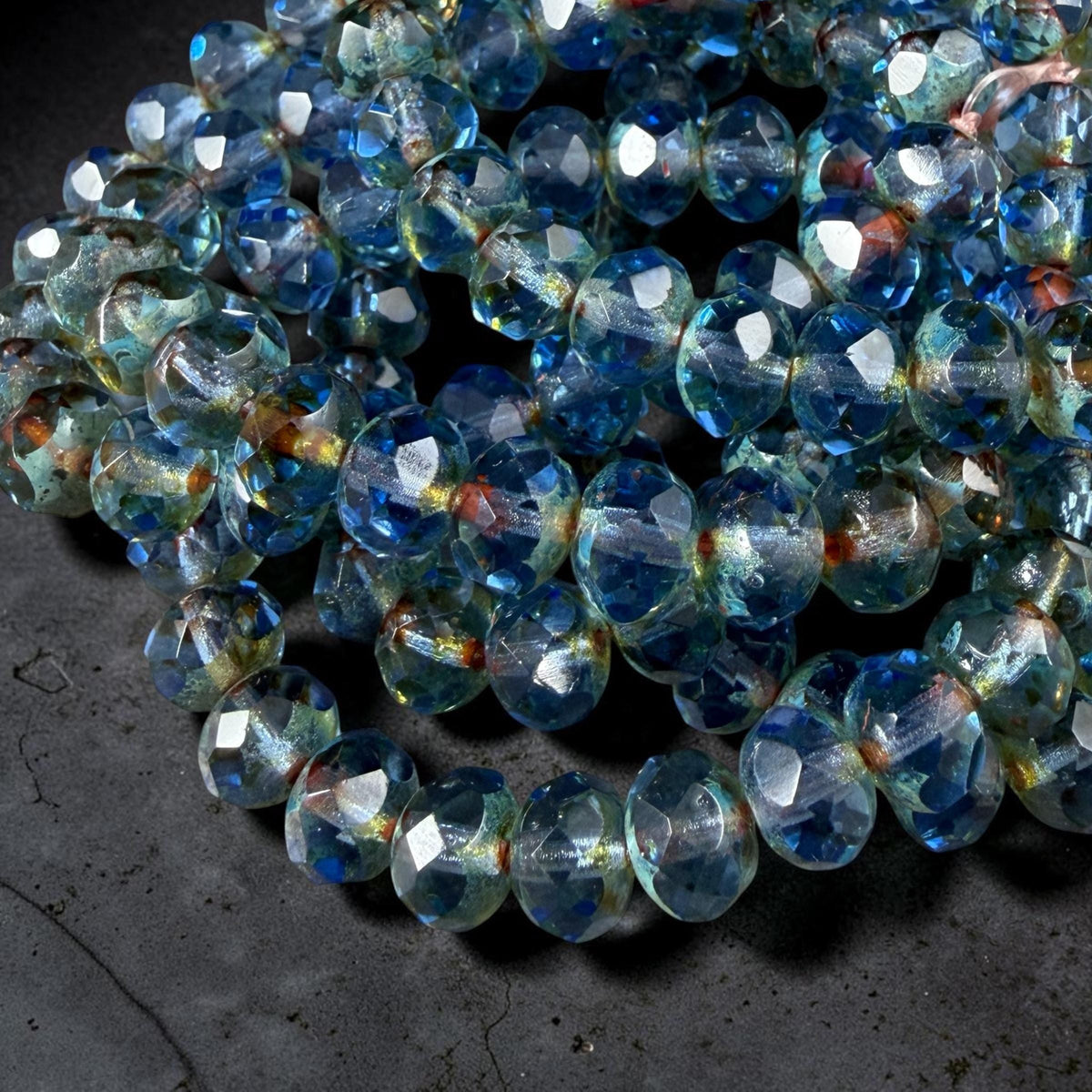 8x6mm Transparent Light Sapphire Blue Picasso Faceted Rondelles (R8/0577) *